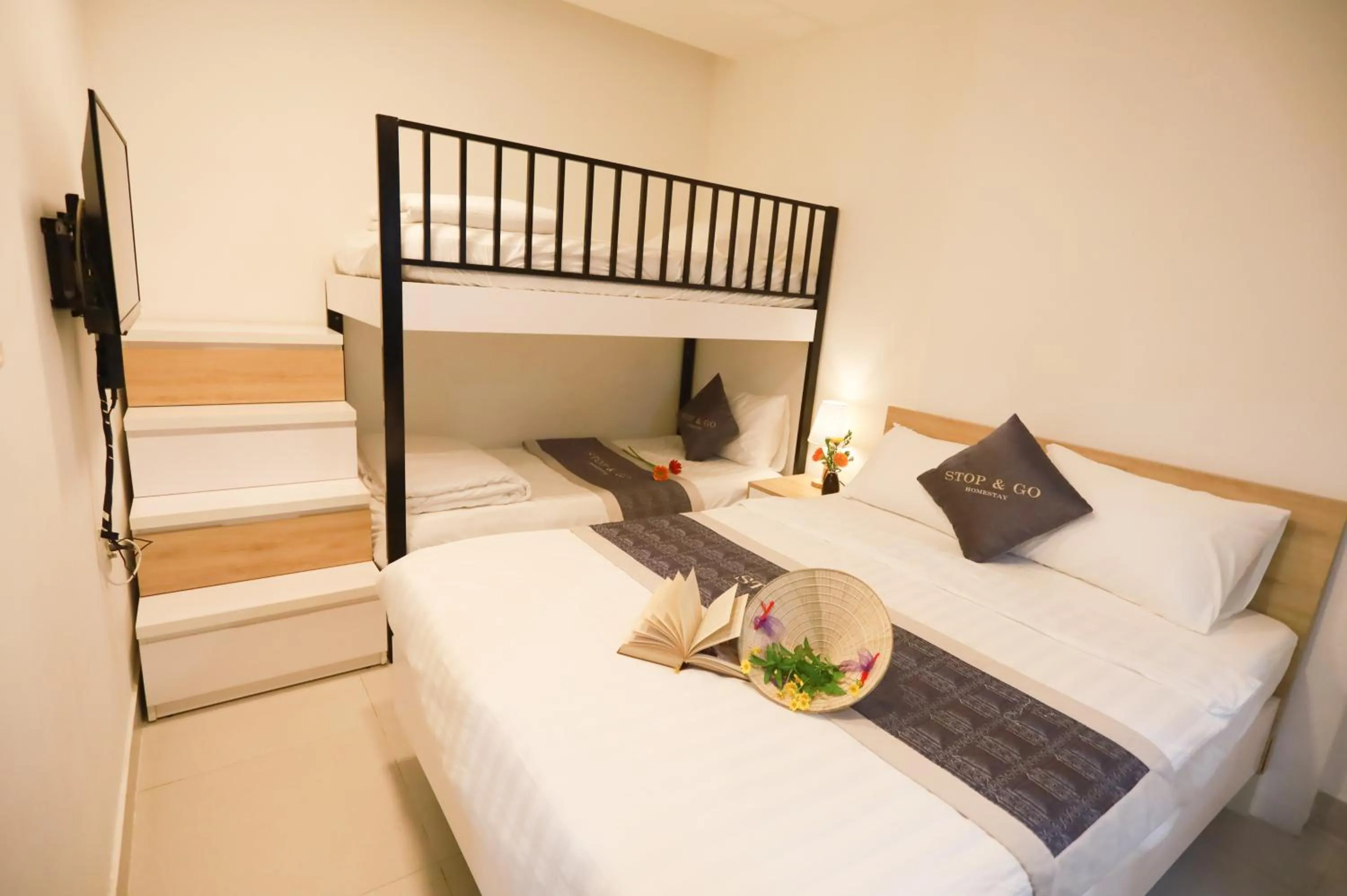 Bed in Stop and Go Boutique Homestay Hue