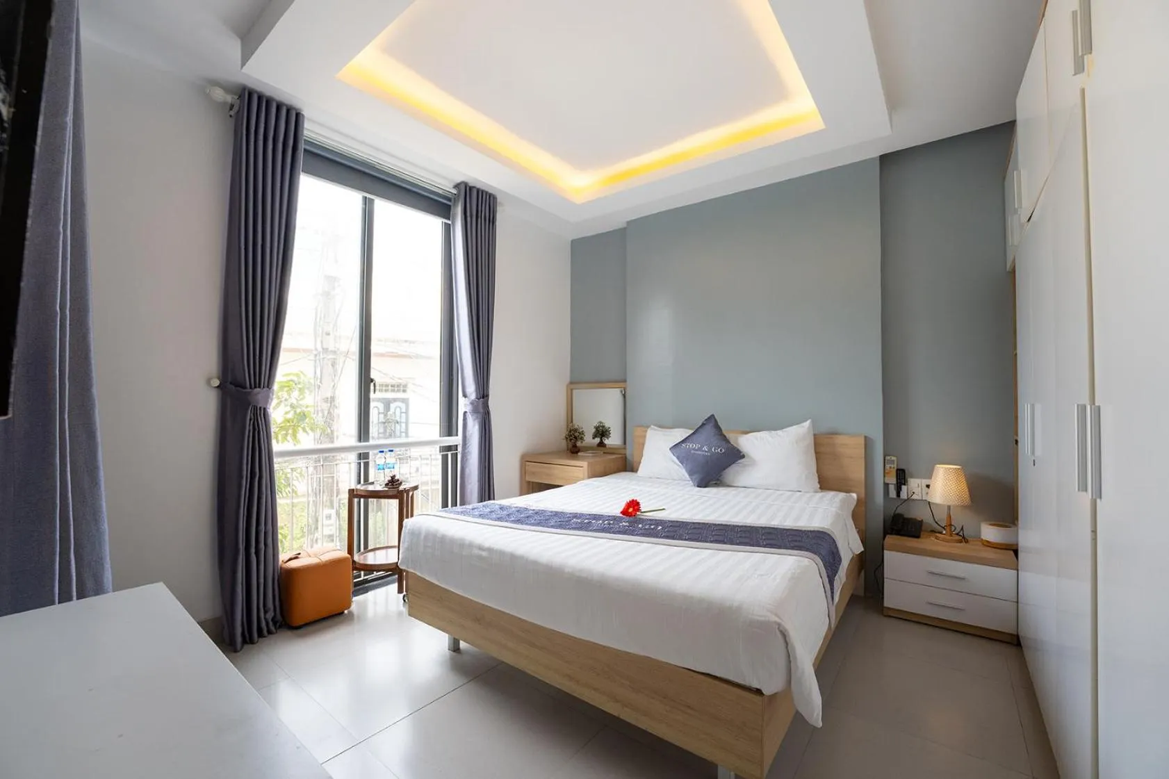 Bed in Stop and Go Boutique Homestay Hue