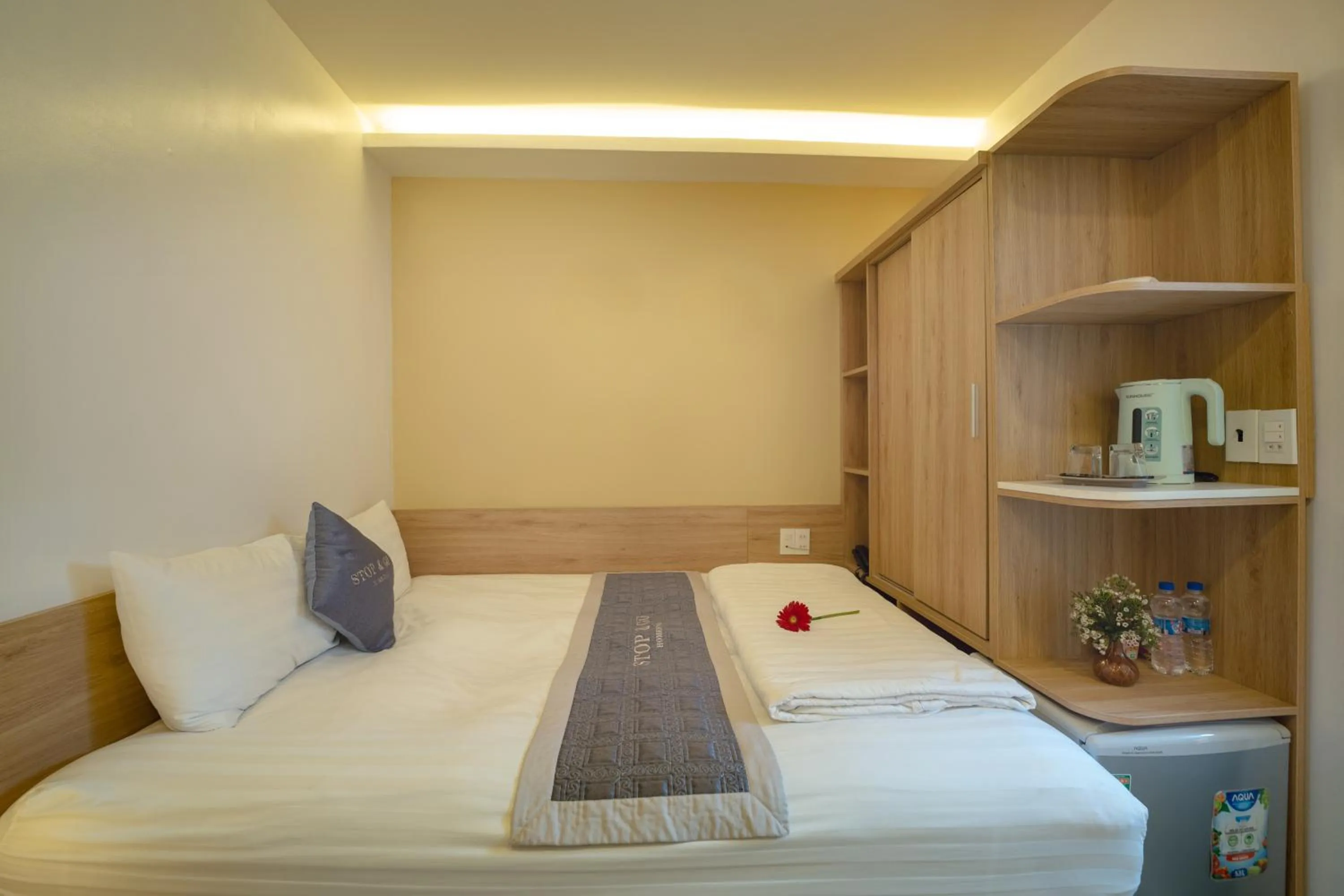 Bed in Stop and Go Boutique Homestay Hue