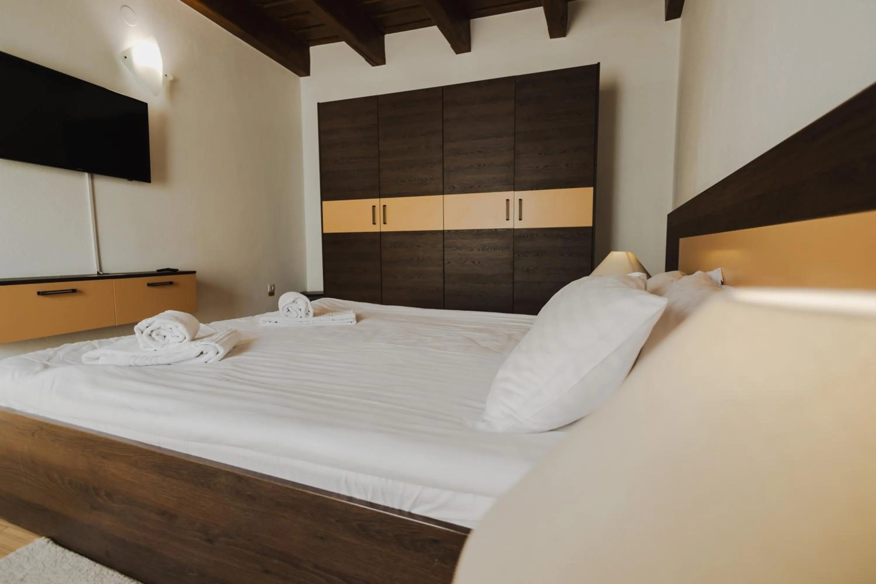 Bed in Casa Nicolae Luxury Suites
