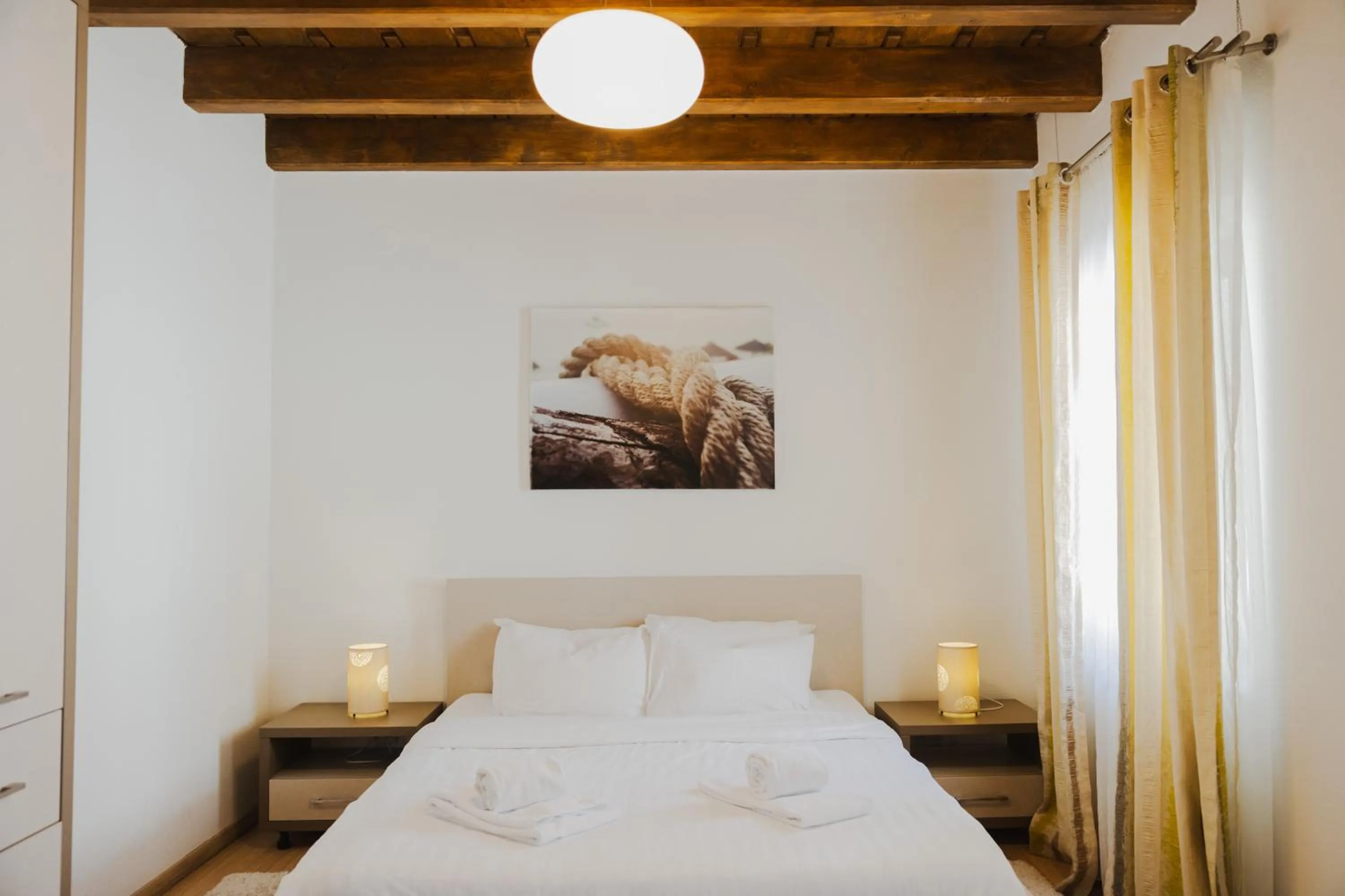 Bed in Casa Nicolae Luxury Suites