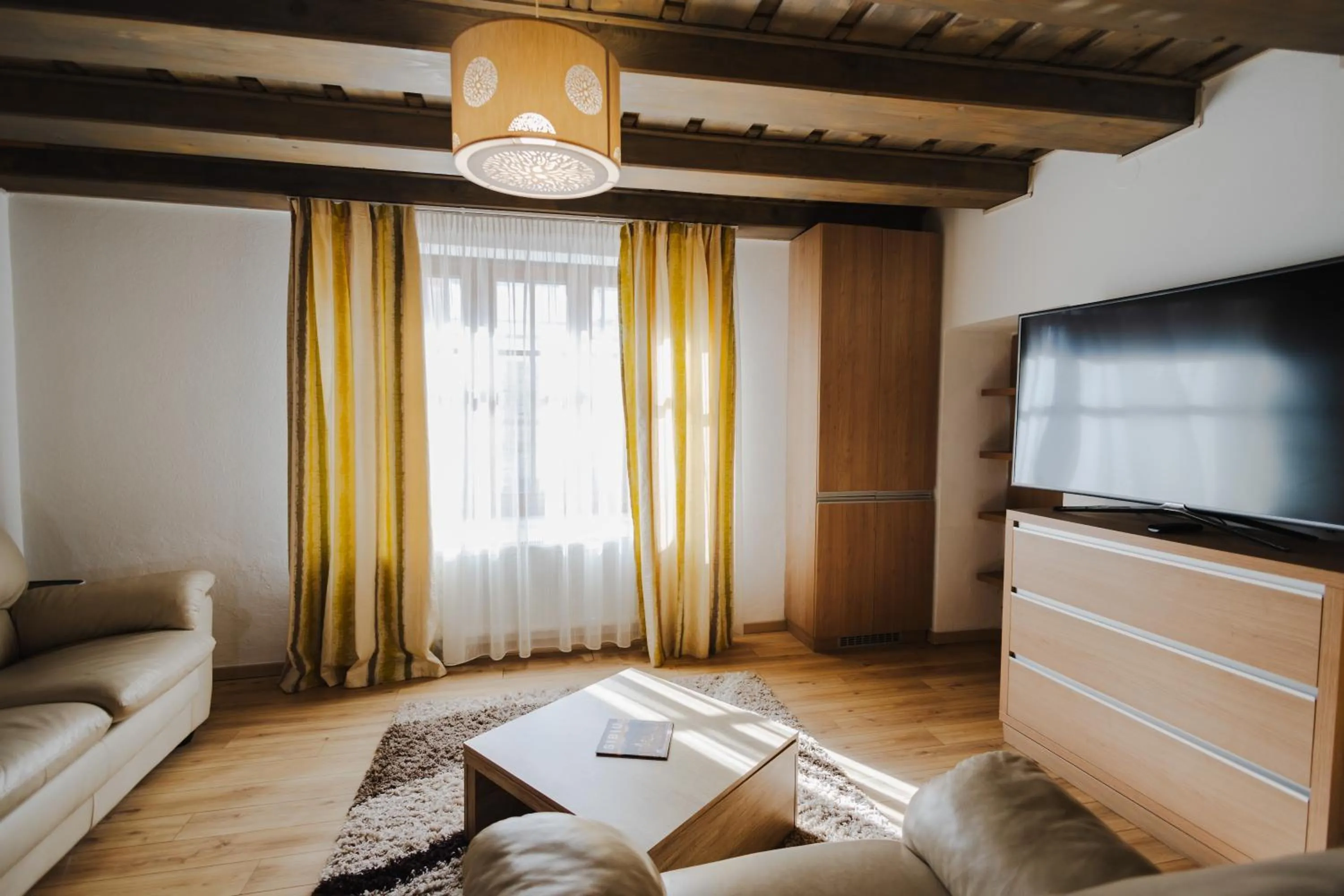 Communal lounge/ TV room in Casa Nicolae Luxury Suites