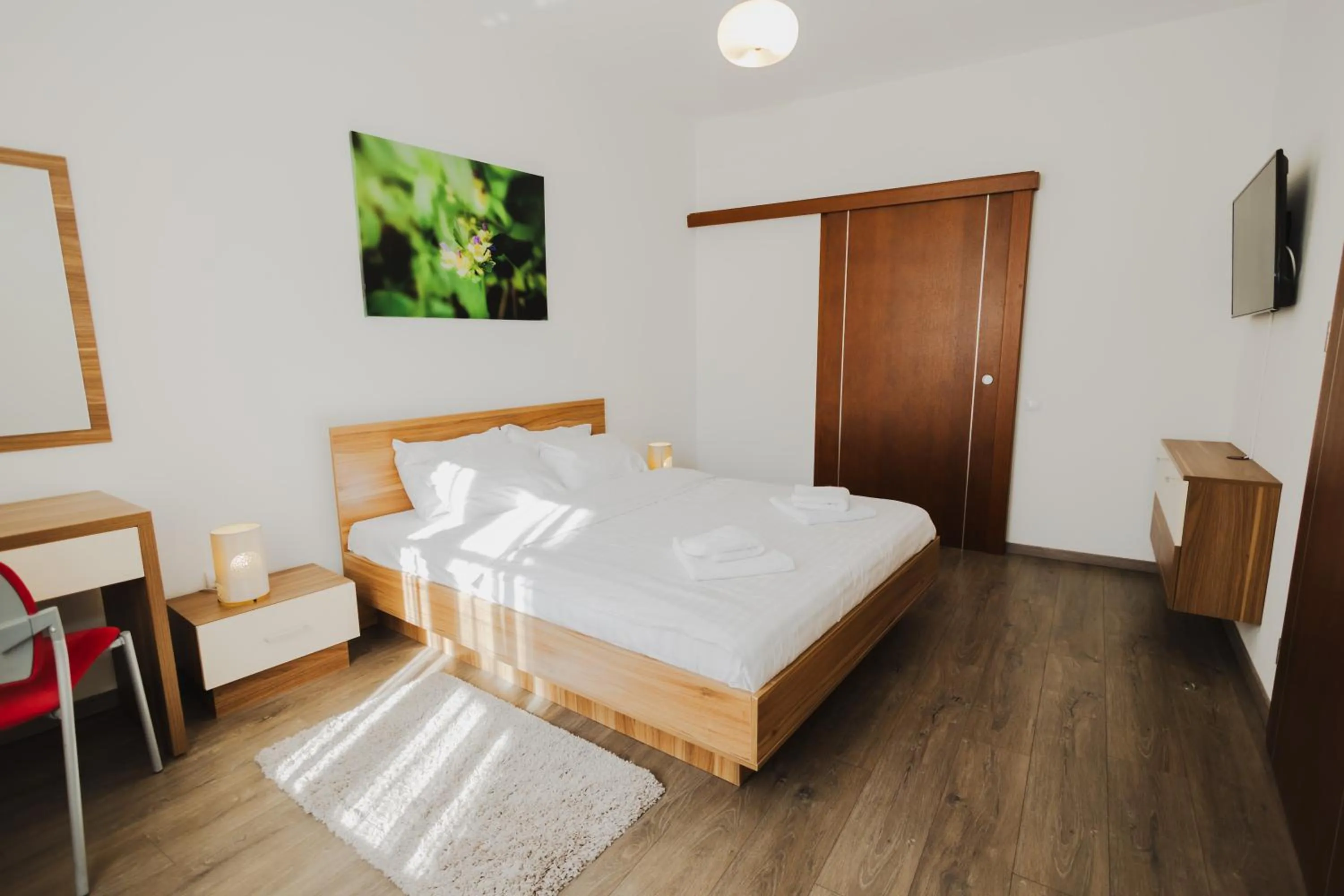 Bed in Casa Nicolae Luxury Suites