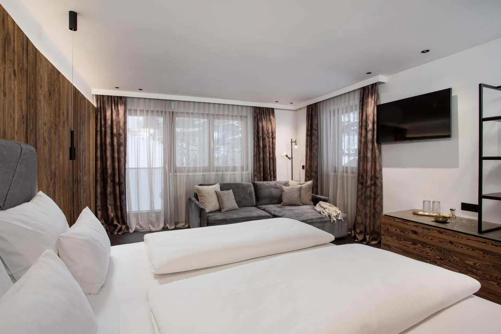 Seating area, Bed in Hotel Gappmaier