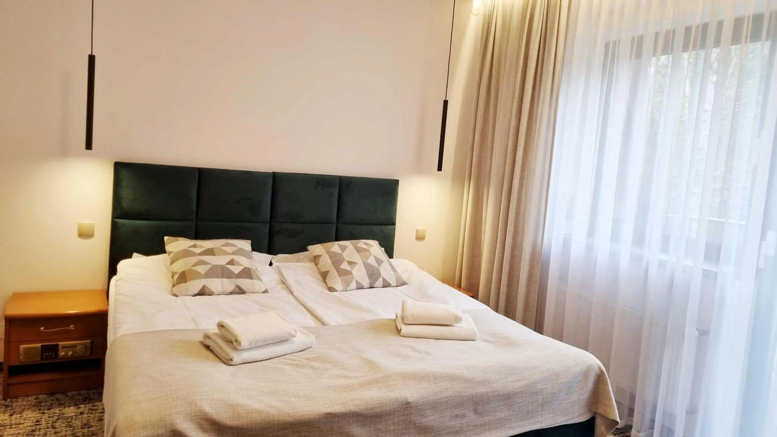 Bed in Hotel Kama Park