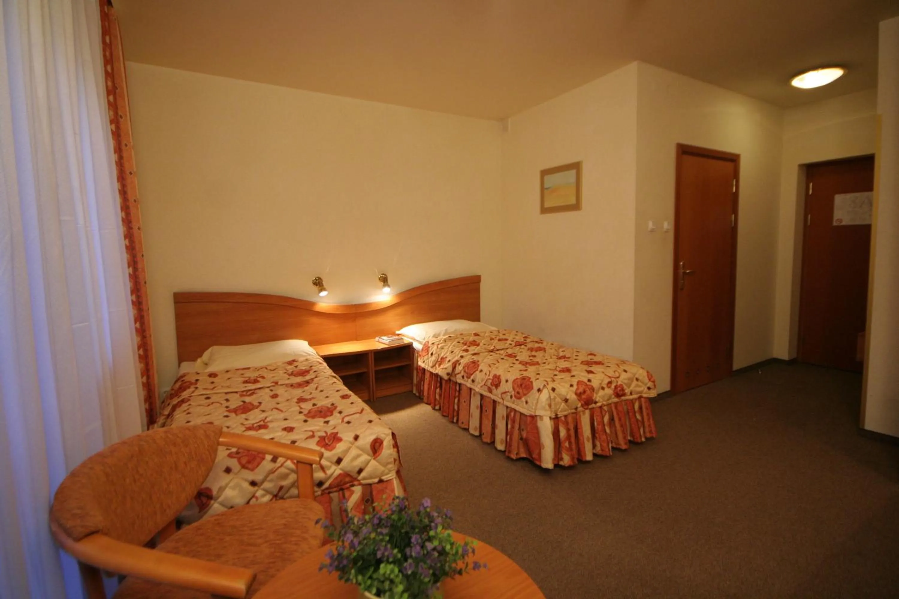 Bed in Hotel Kama Park