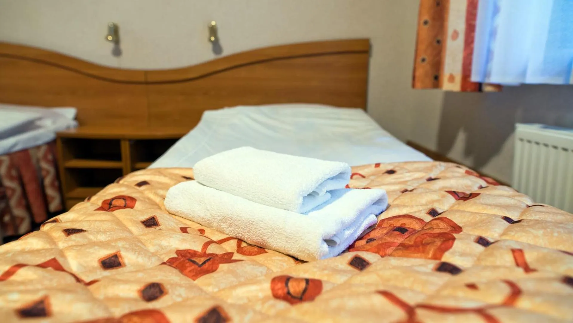 Bed in Hotel Kama Park