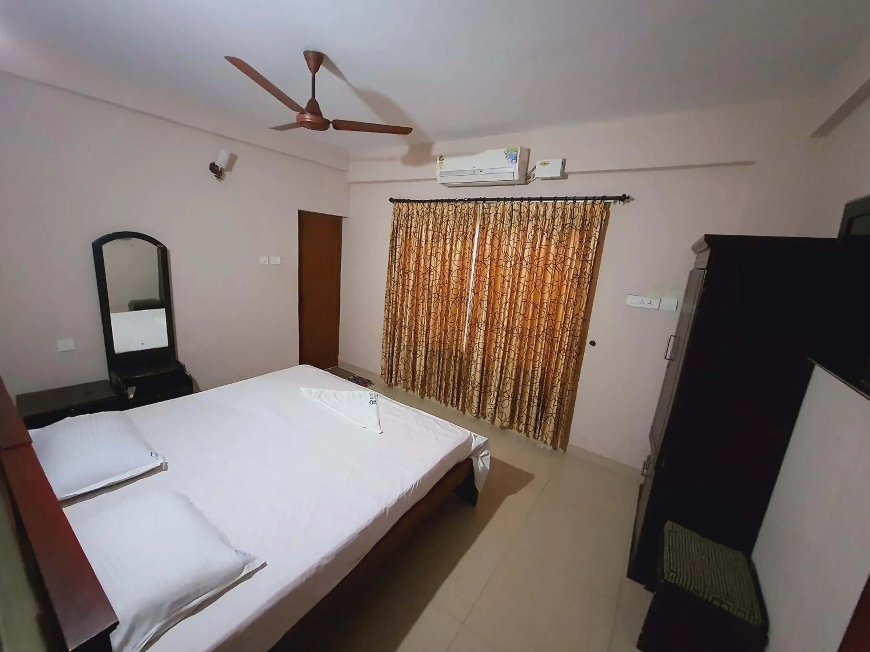 Deluxe Double Room (2 Adults + 1 Child) in Ruby Residency Deluxe Double Room (2 Adults + 1 Child) in Ruby Residency