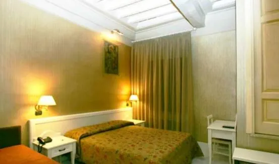 Photo of the whole room, Bed in Palazzo Riario