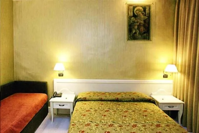 Photo of the whole room, Bed in Palazzo Riario