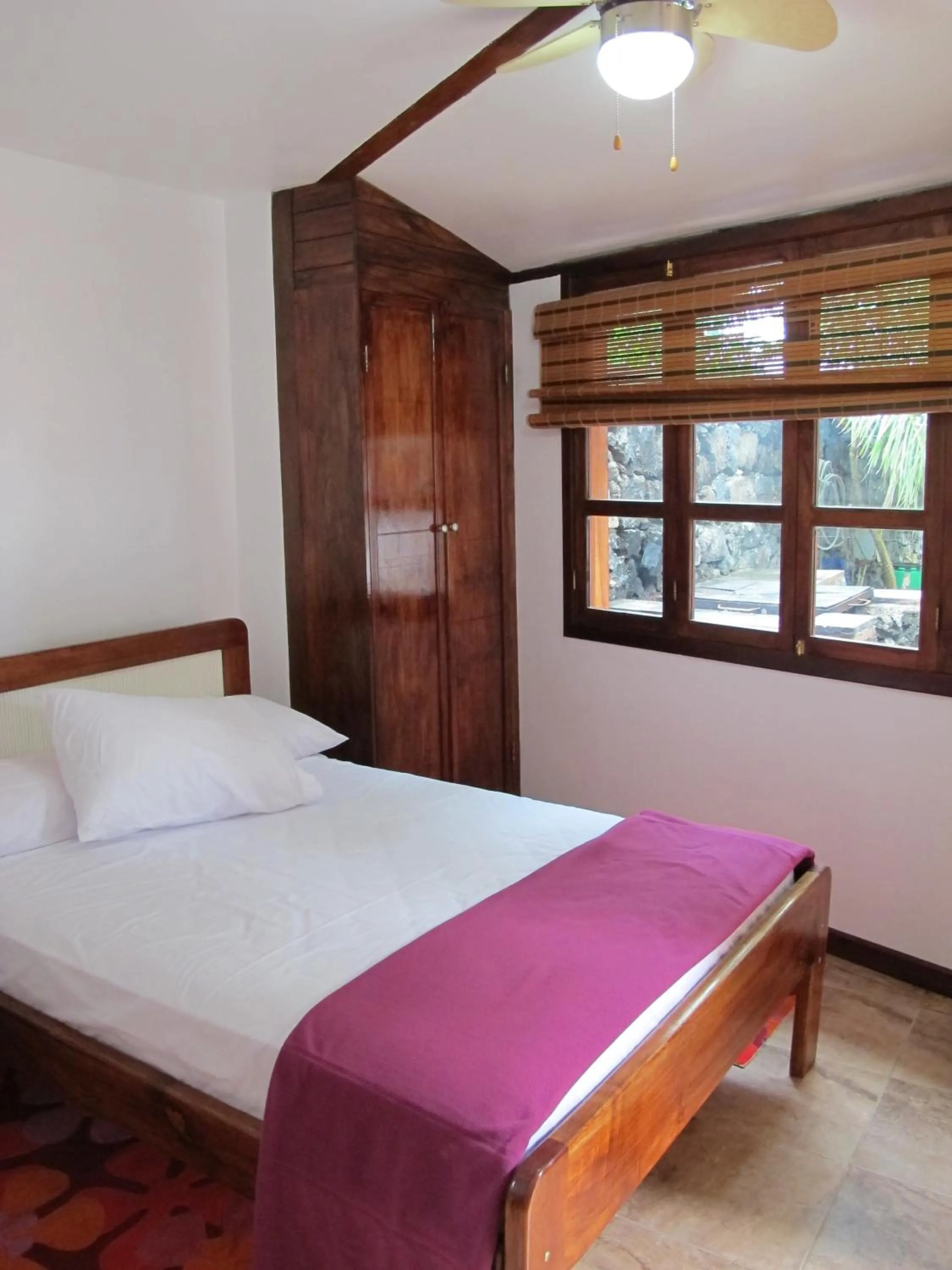 Bed in The Wooden House Hotel
