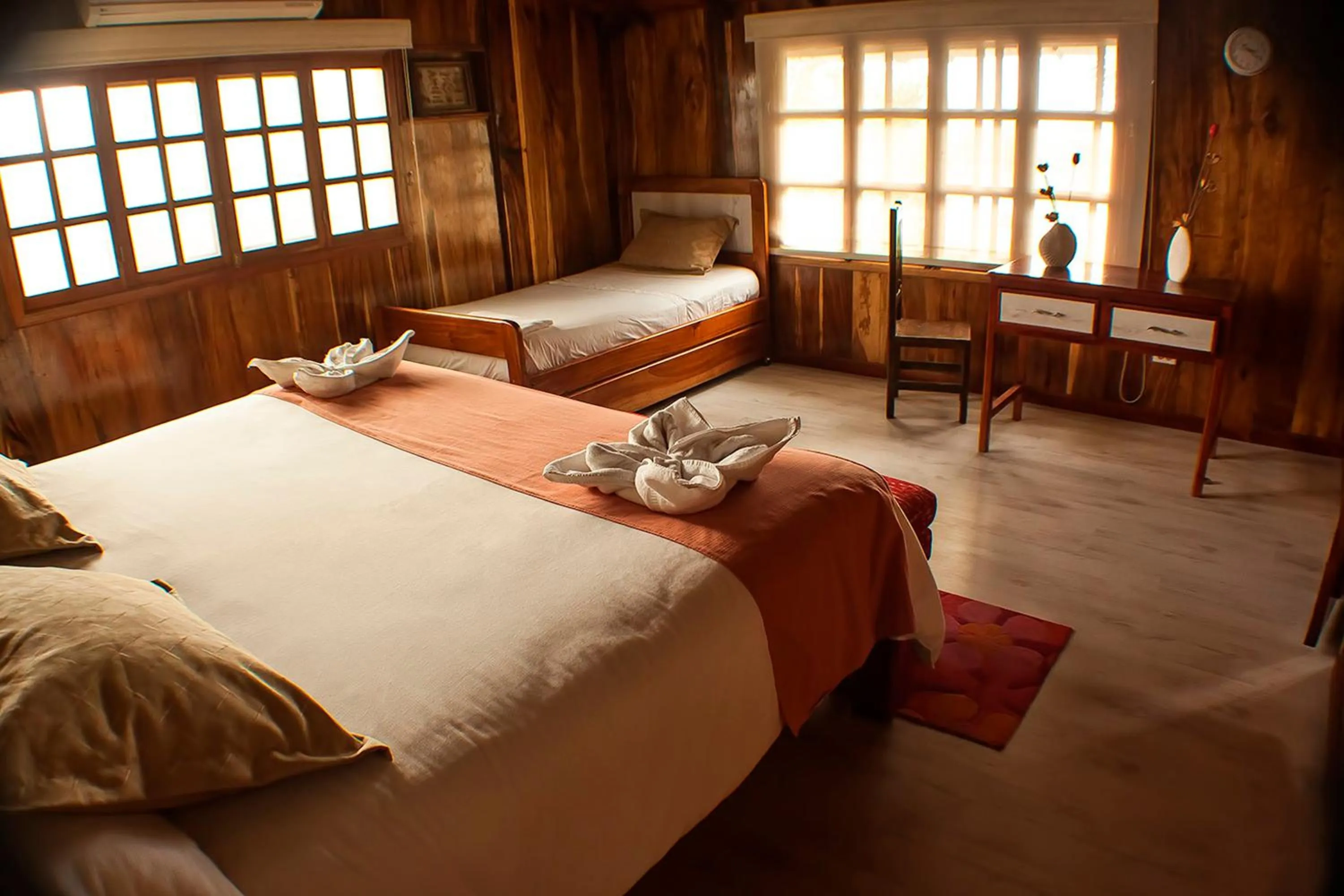 Bed in The Wooden House Hotel