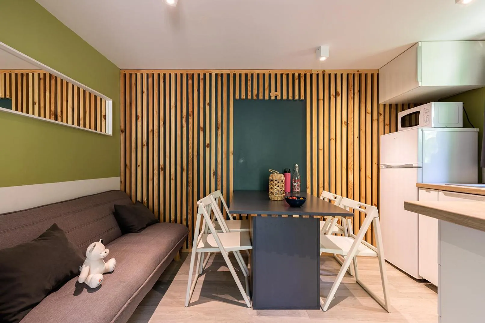 Kitchen or kitchenette in Village Nature et Océan à côté de la plage avec piscine et jacuzzi