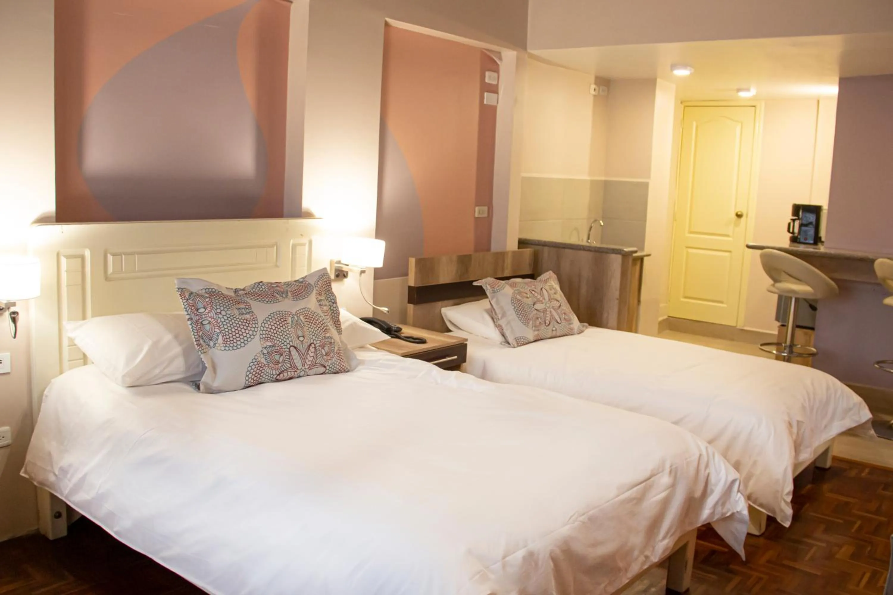 Kitchen or kitchenette, Bed in Hotel Sandmelis