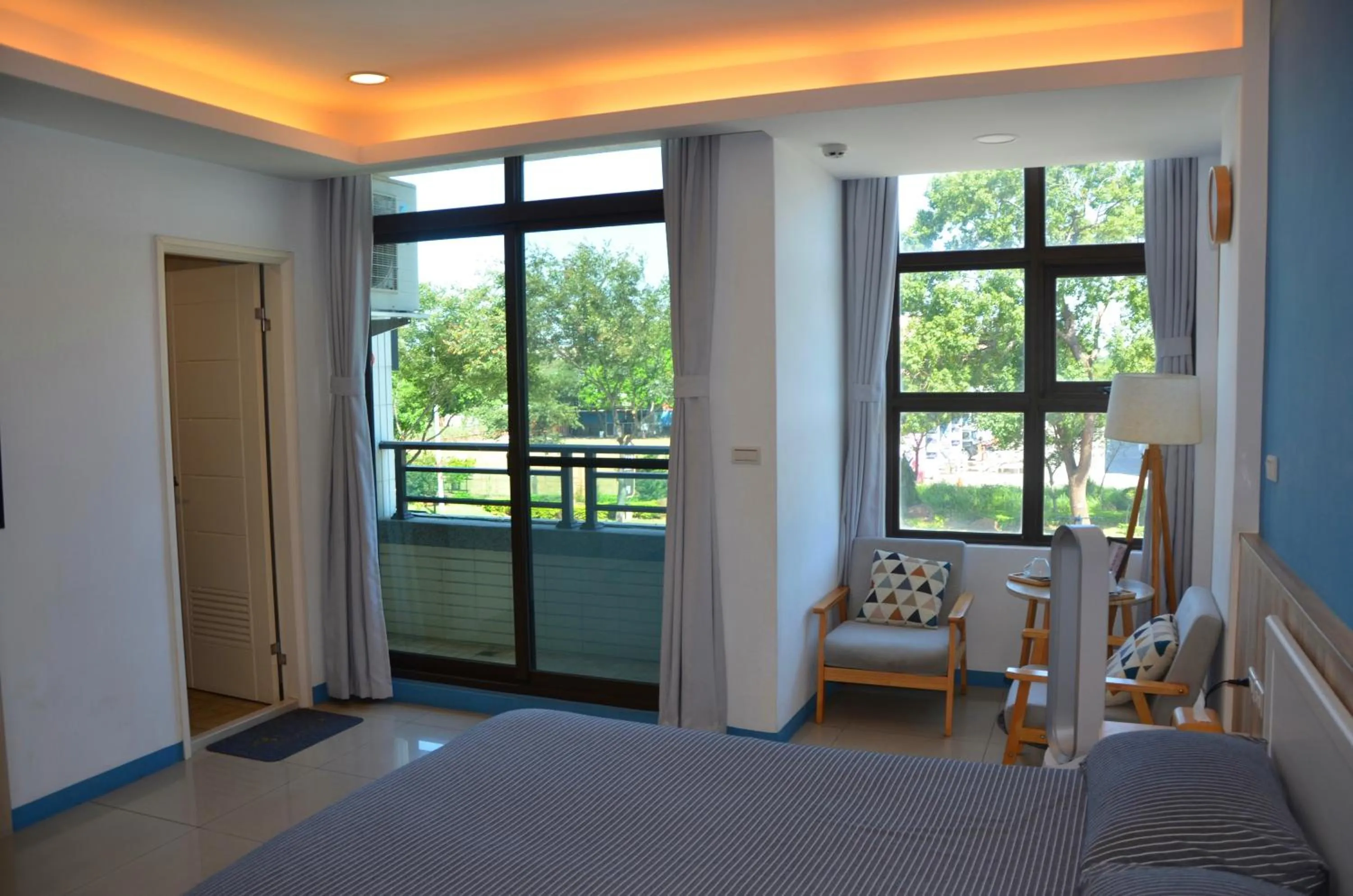 Balcony/Terrace, Bed in Blowing in the wind Homestay