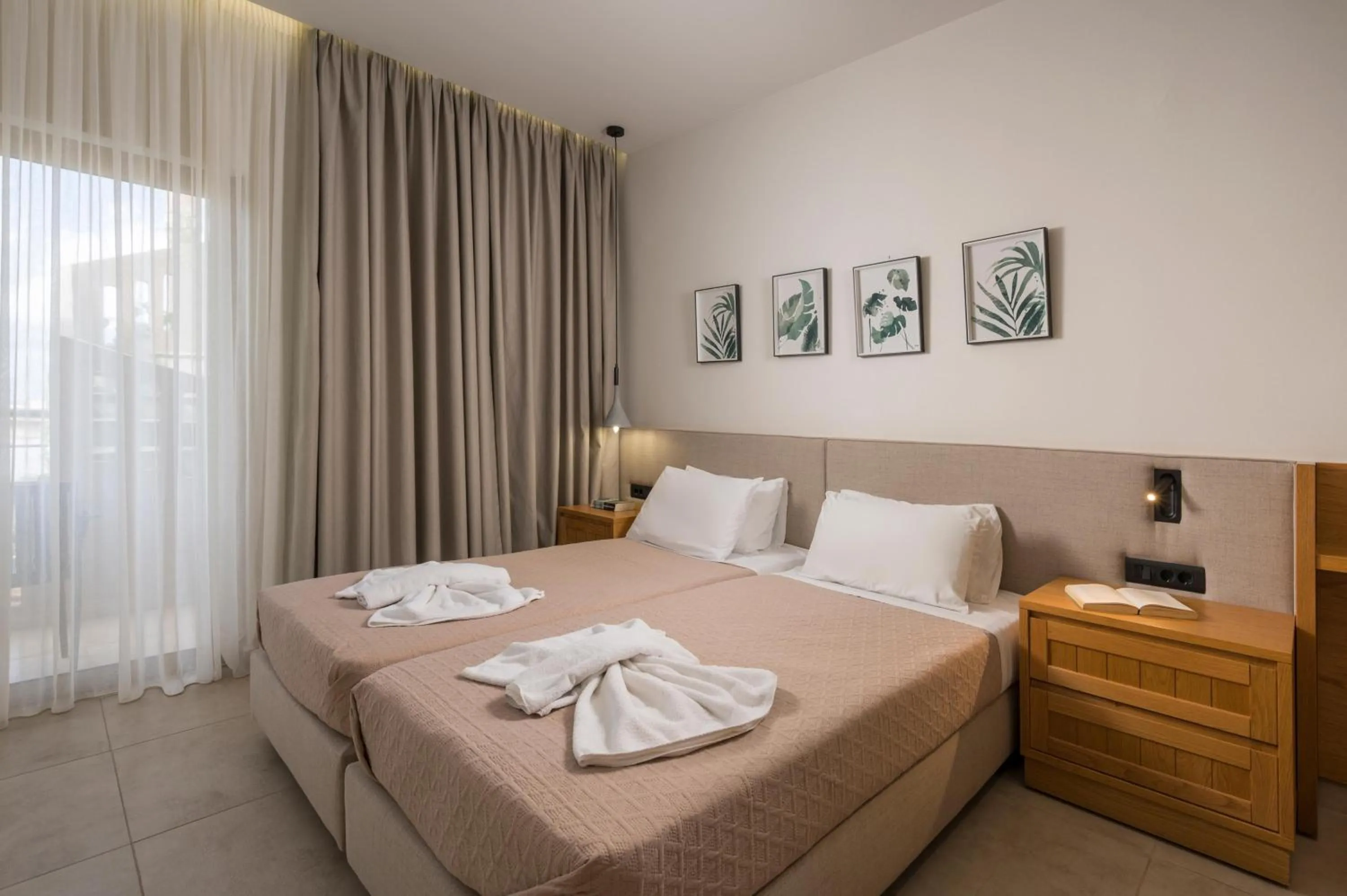 Bed in Petritos Rooms and Studios