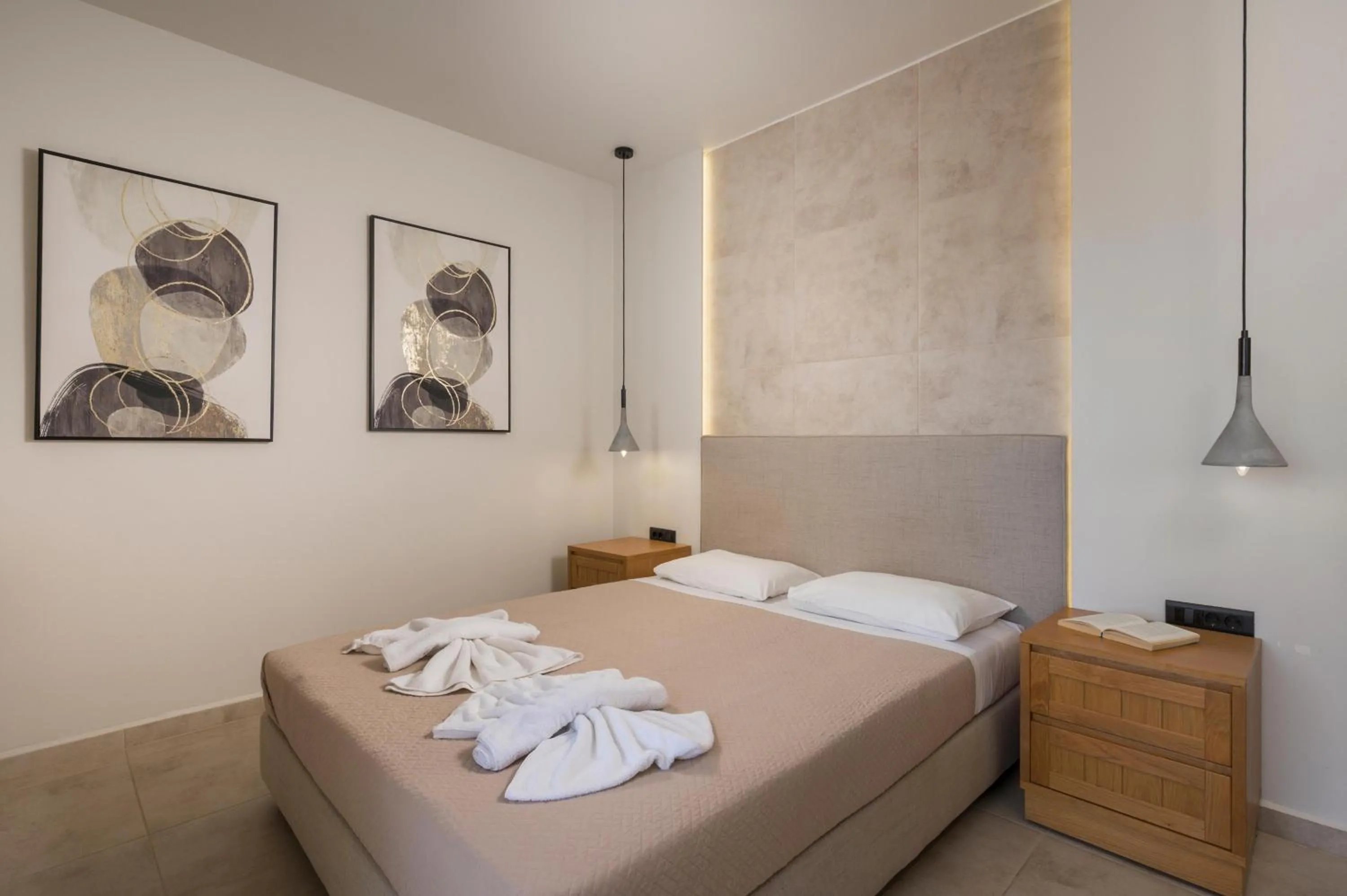 Bed in Petritos Rooms and Studios