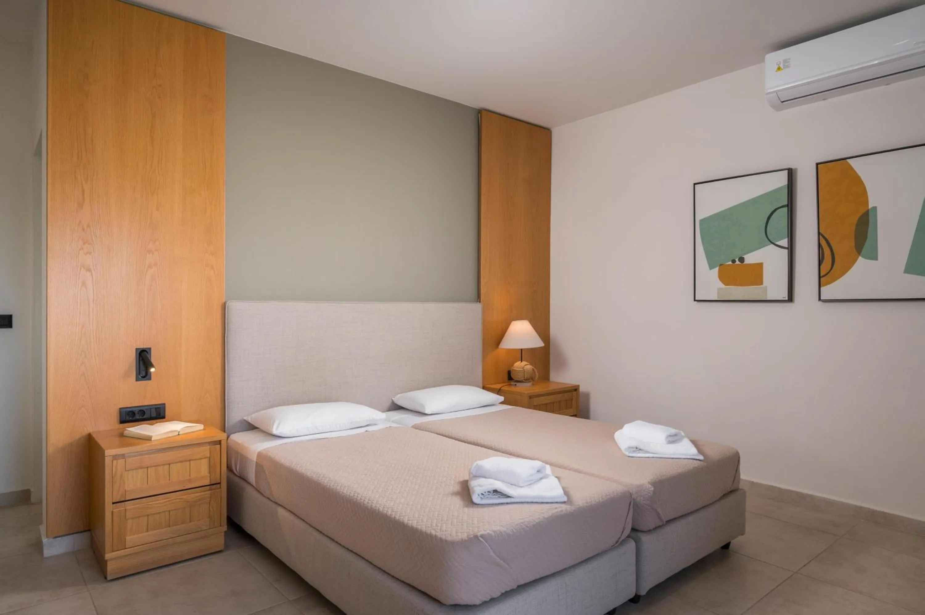 Bed in Petritos Rooms and Studios