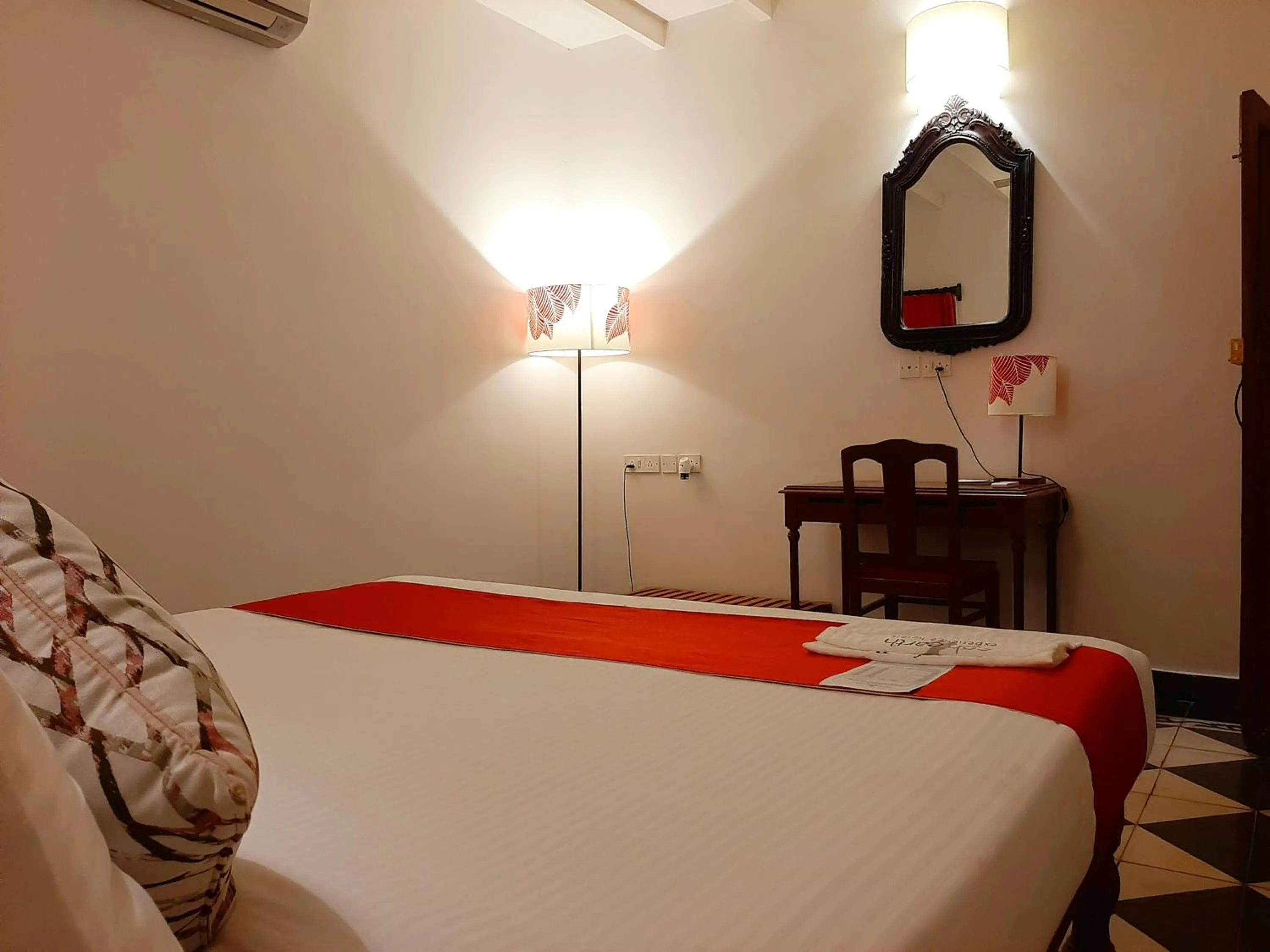 Bed in Mantra Koodam Kumbakonam - A CGH Earth Experience