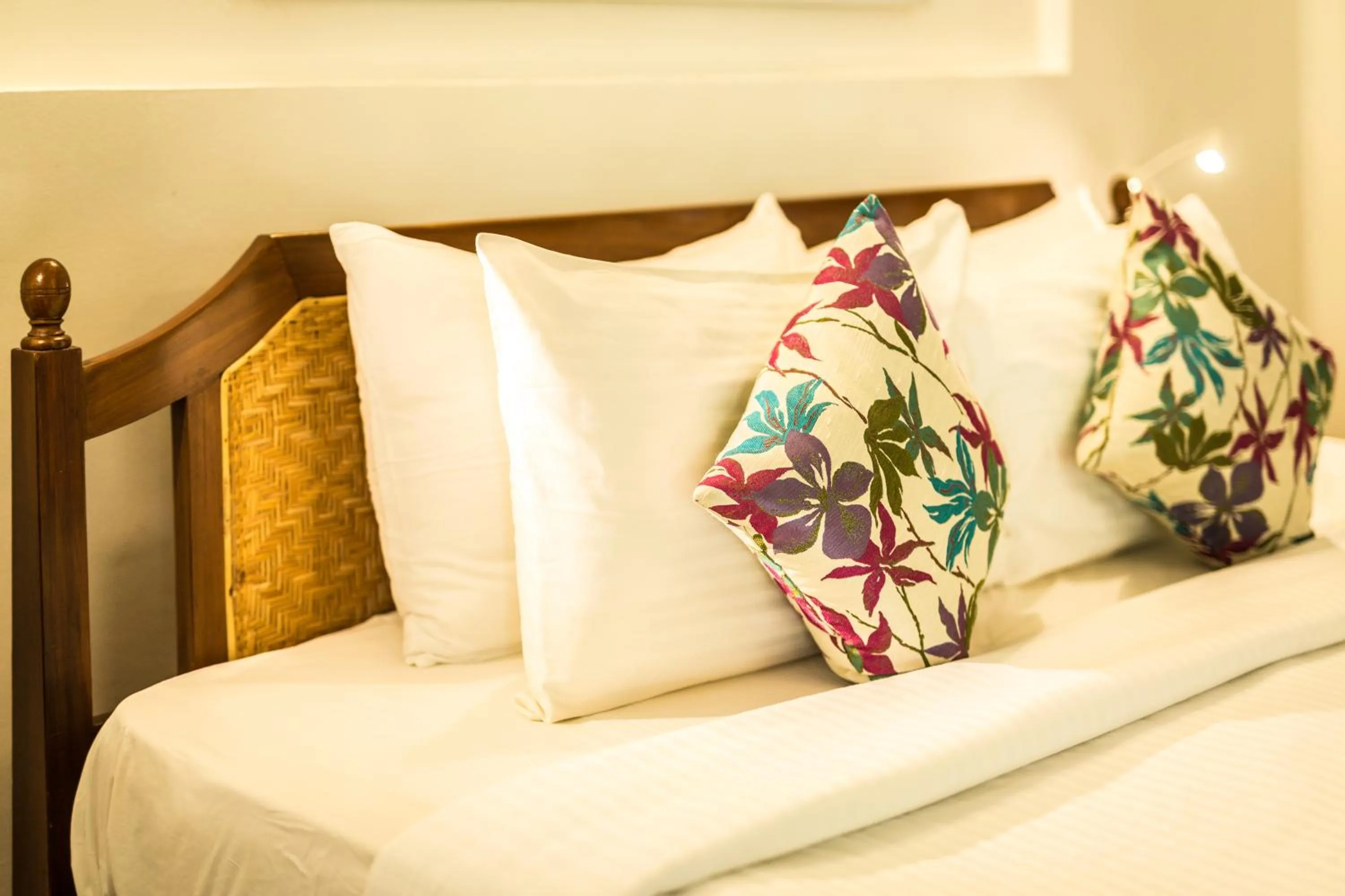 Bed in Mantra Koodam Kumbakonam - A CGH Earth Experience