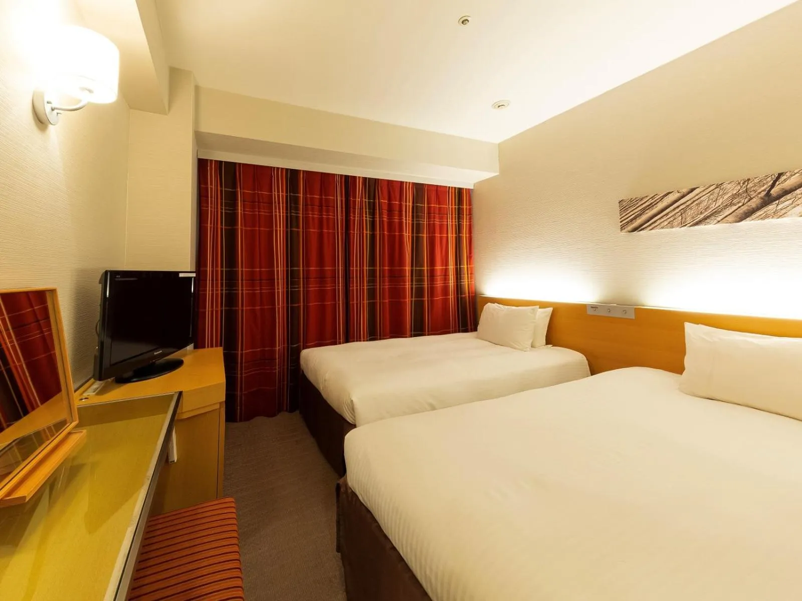 Bed in Hotel Keihan Kyobashi Grande