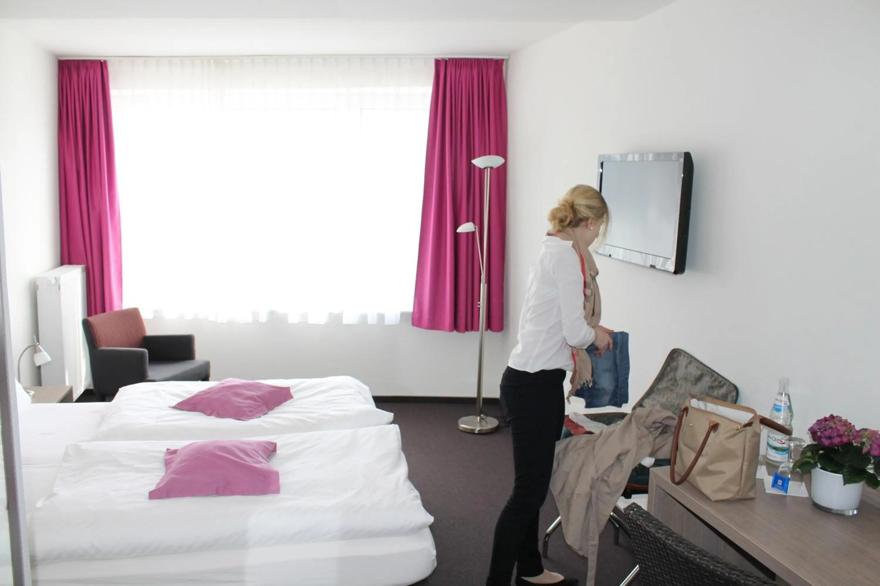 Bed in RheinHotel ARTE
