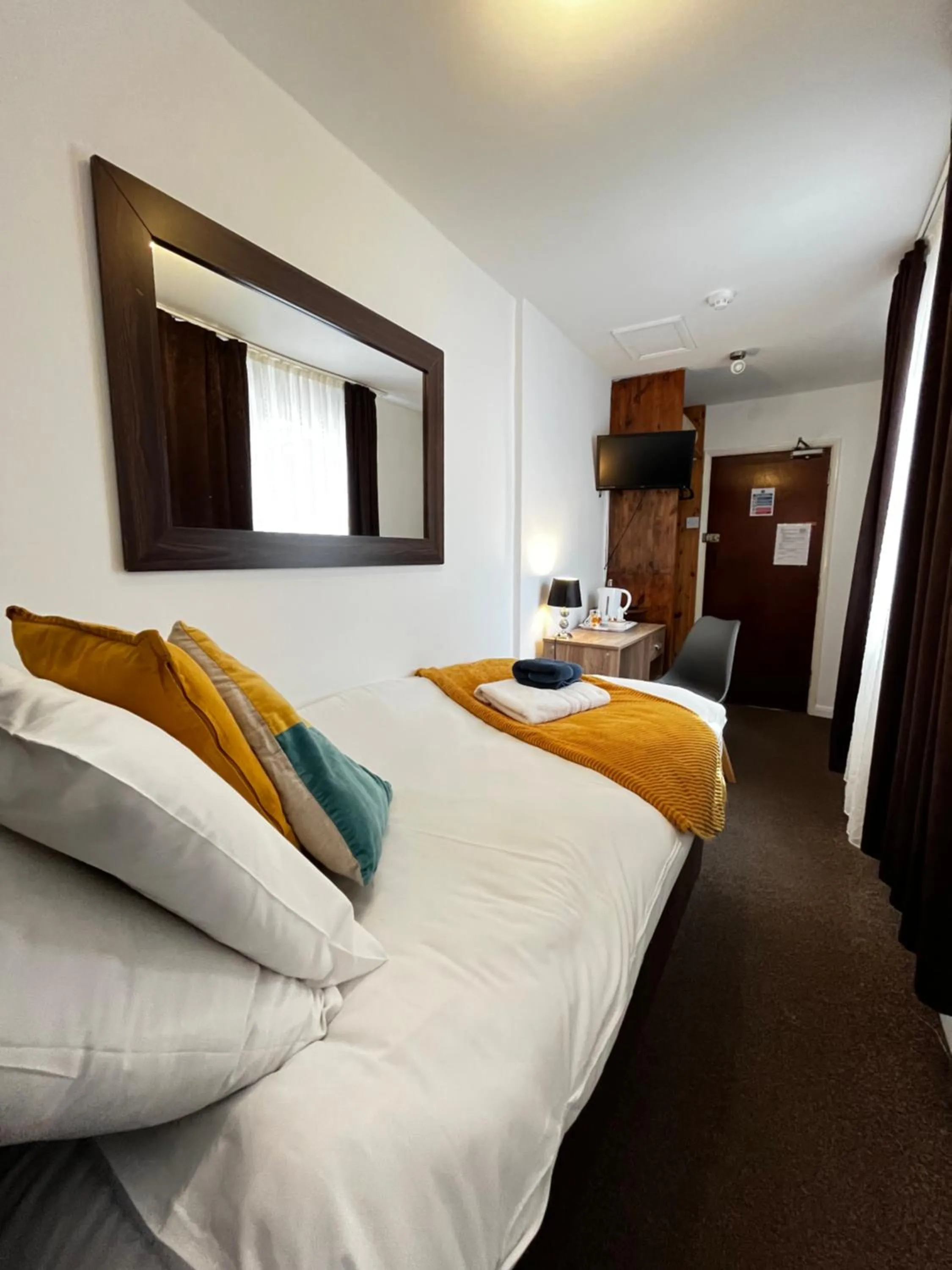 Bed in Old Palace Guest House