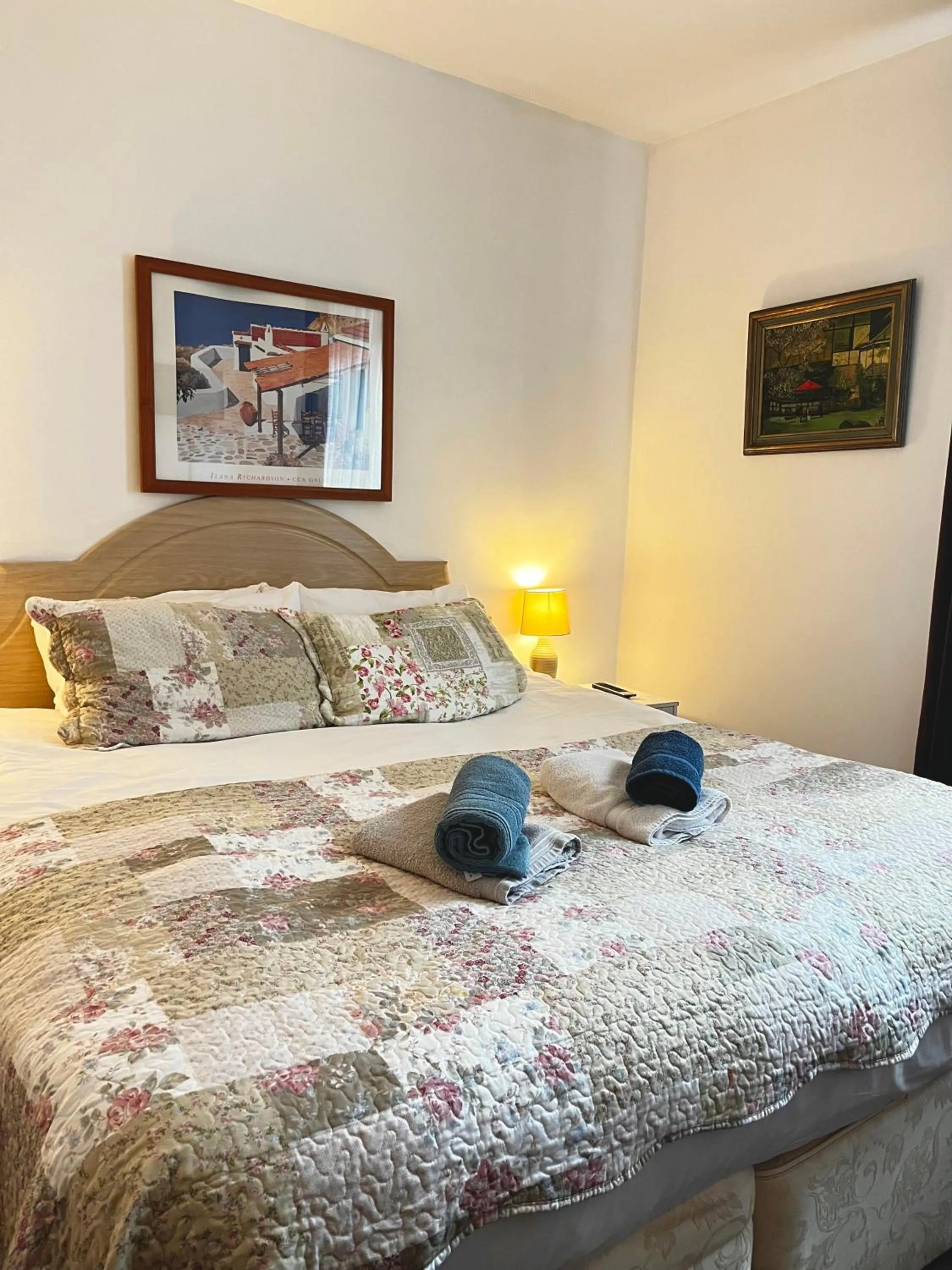 Bed in Old Palace Guest House