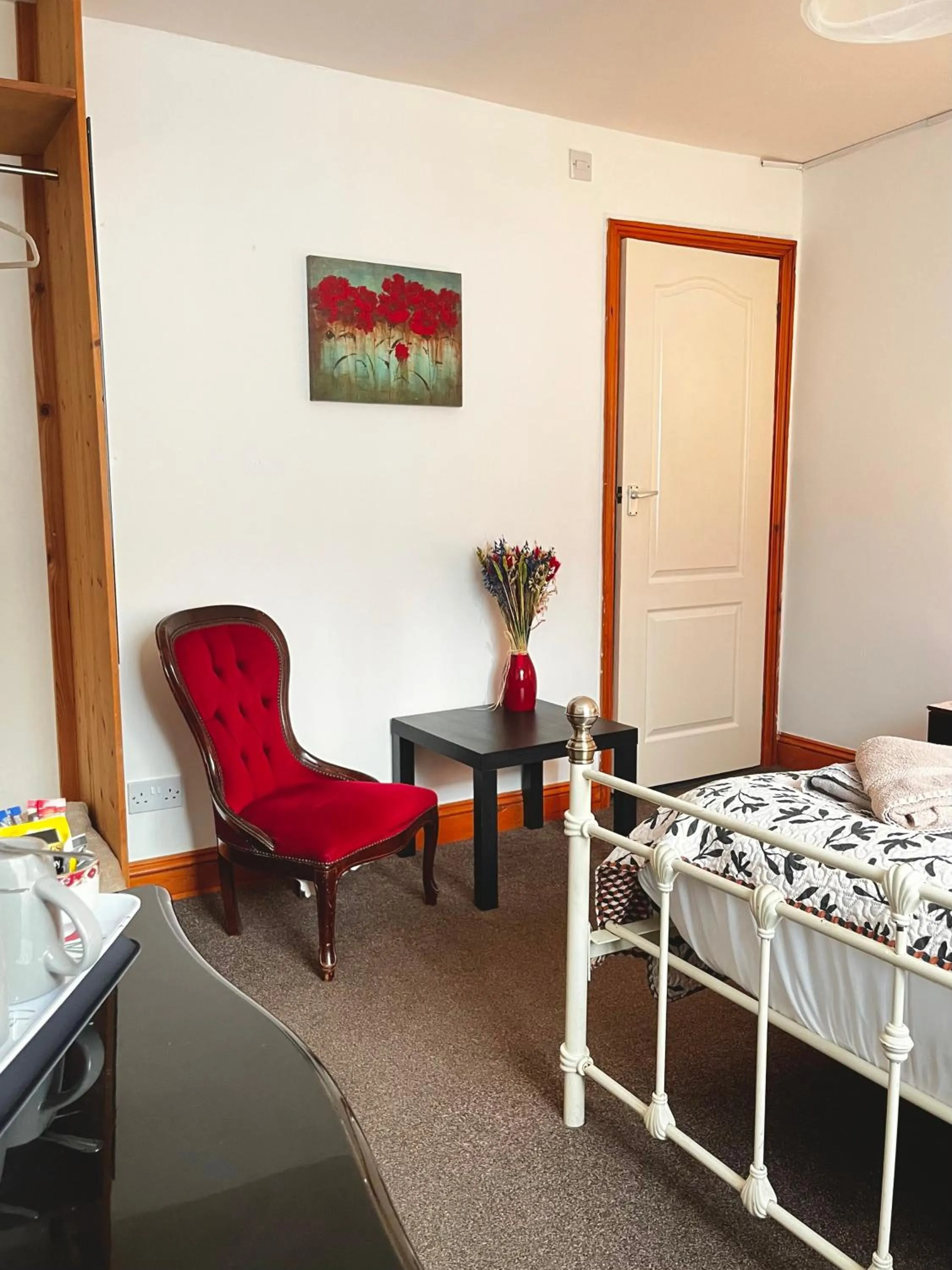 Bed in Old Palace Guest House