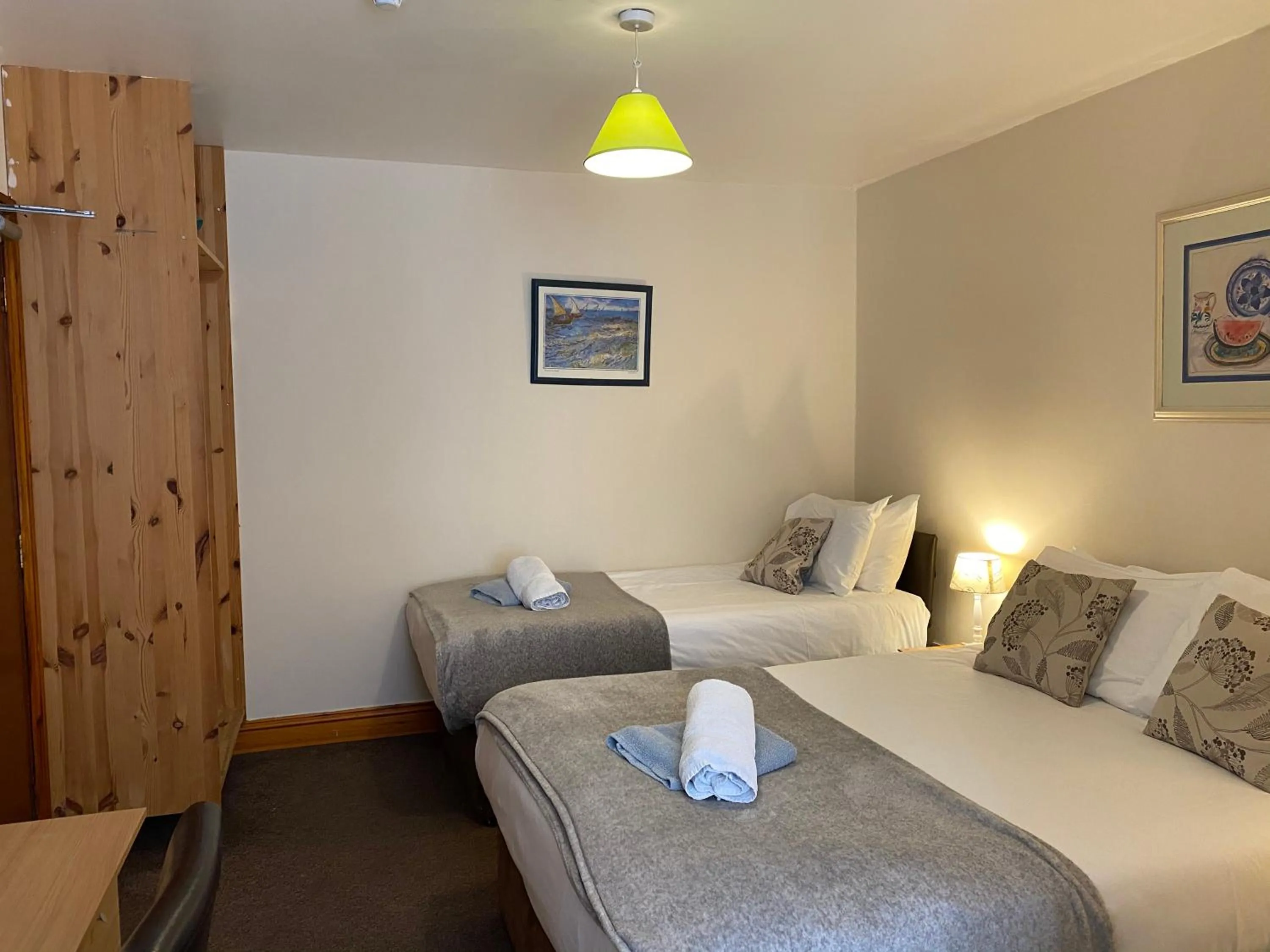 Bed in Old Palace Guest House