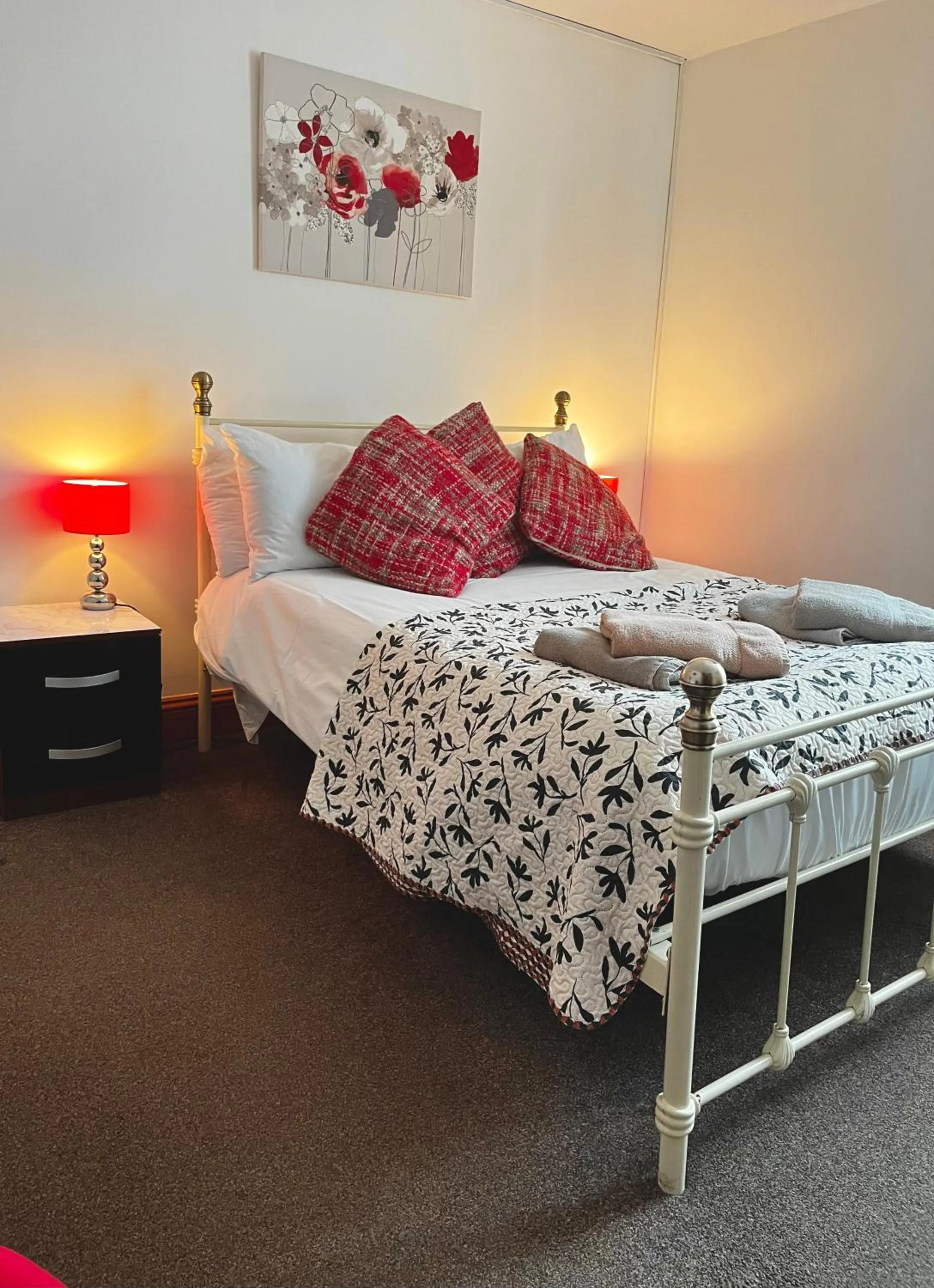 Bed in Old Palace Guest House