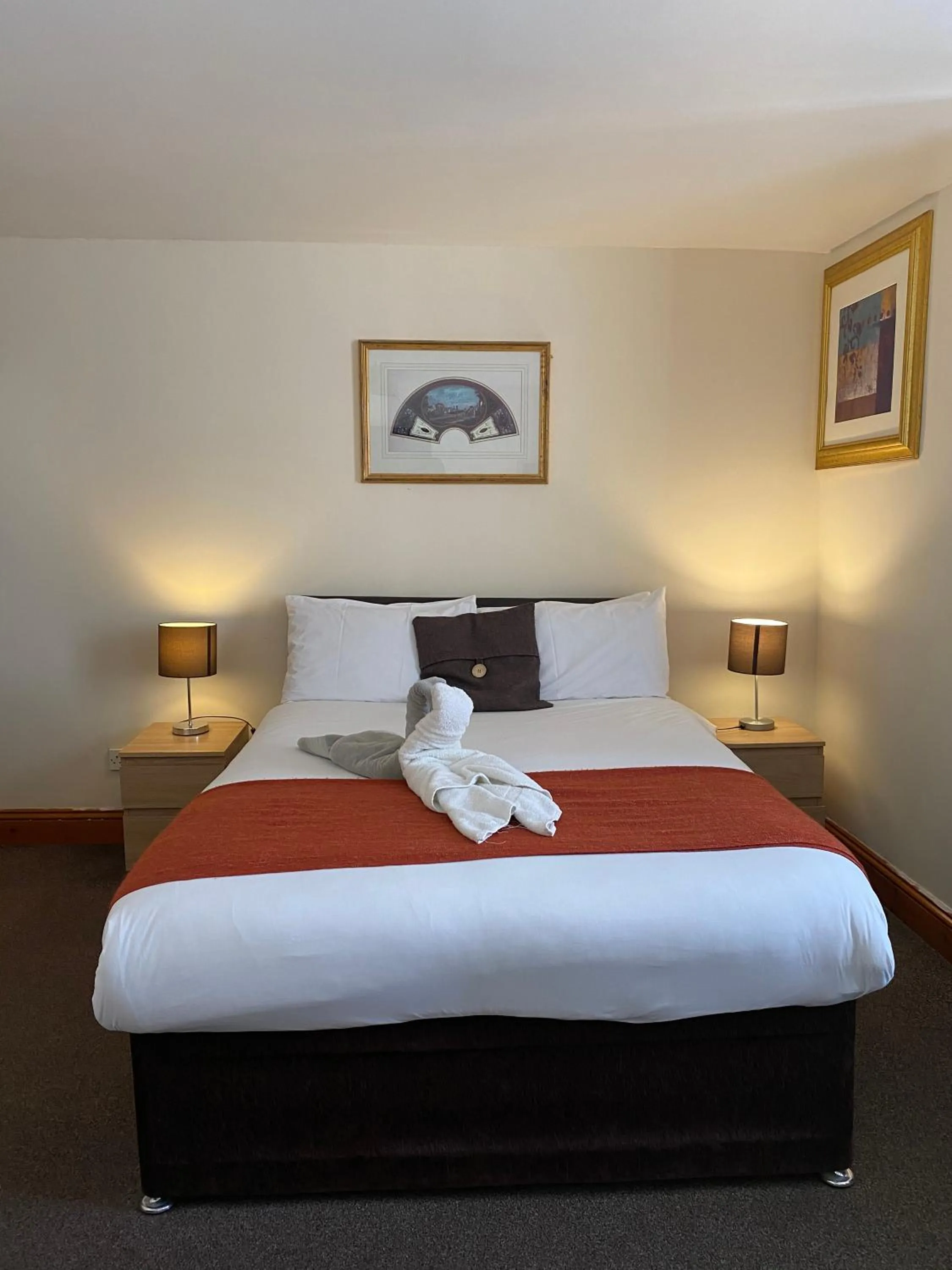 Bed in Old Palace Guest House