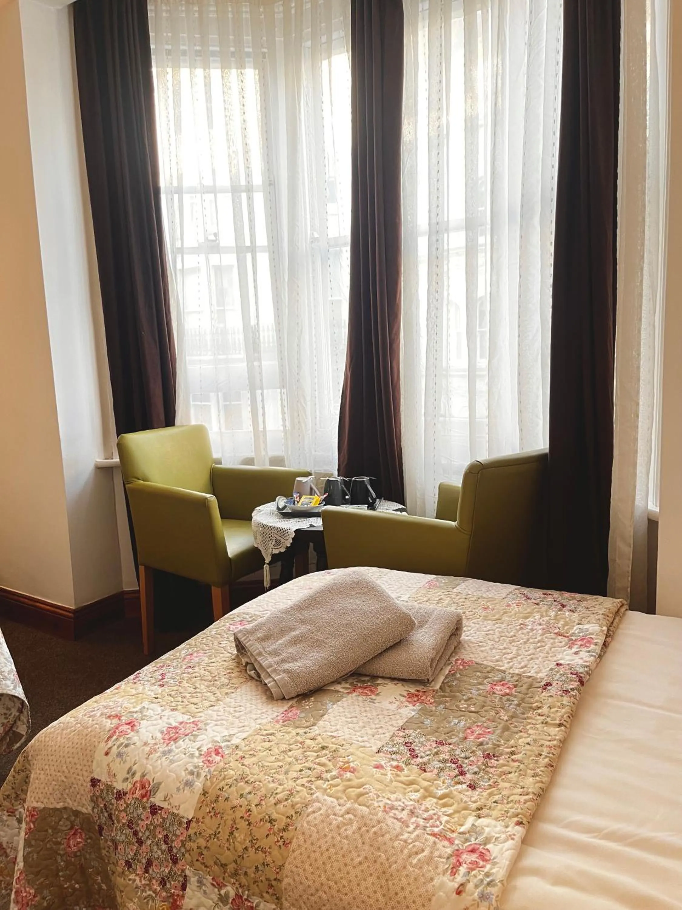 Bed in Old Palace Guest House