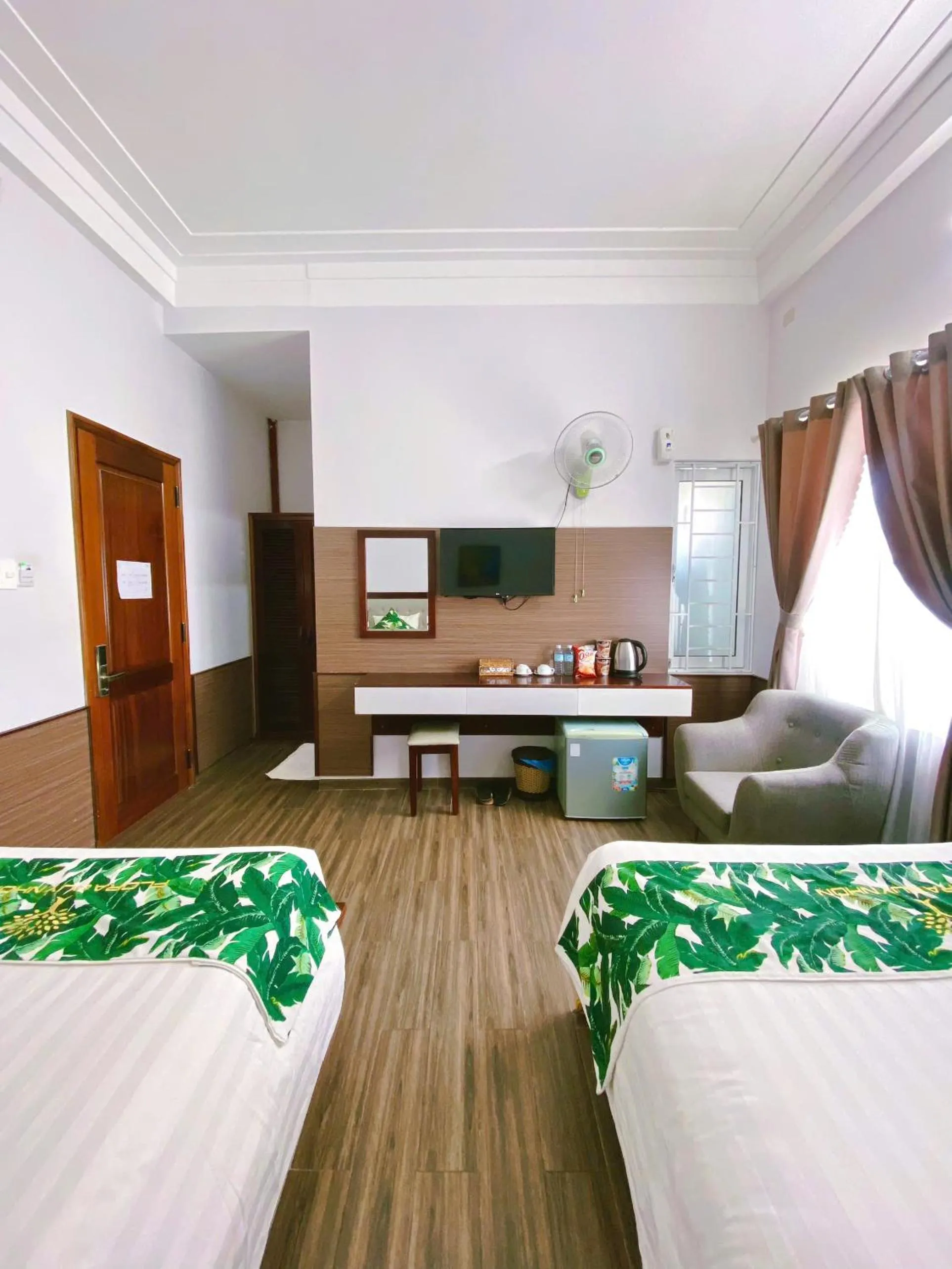 Bed in Flora Quy Nhon Hotel