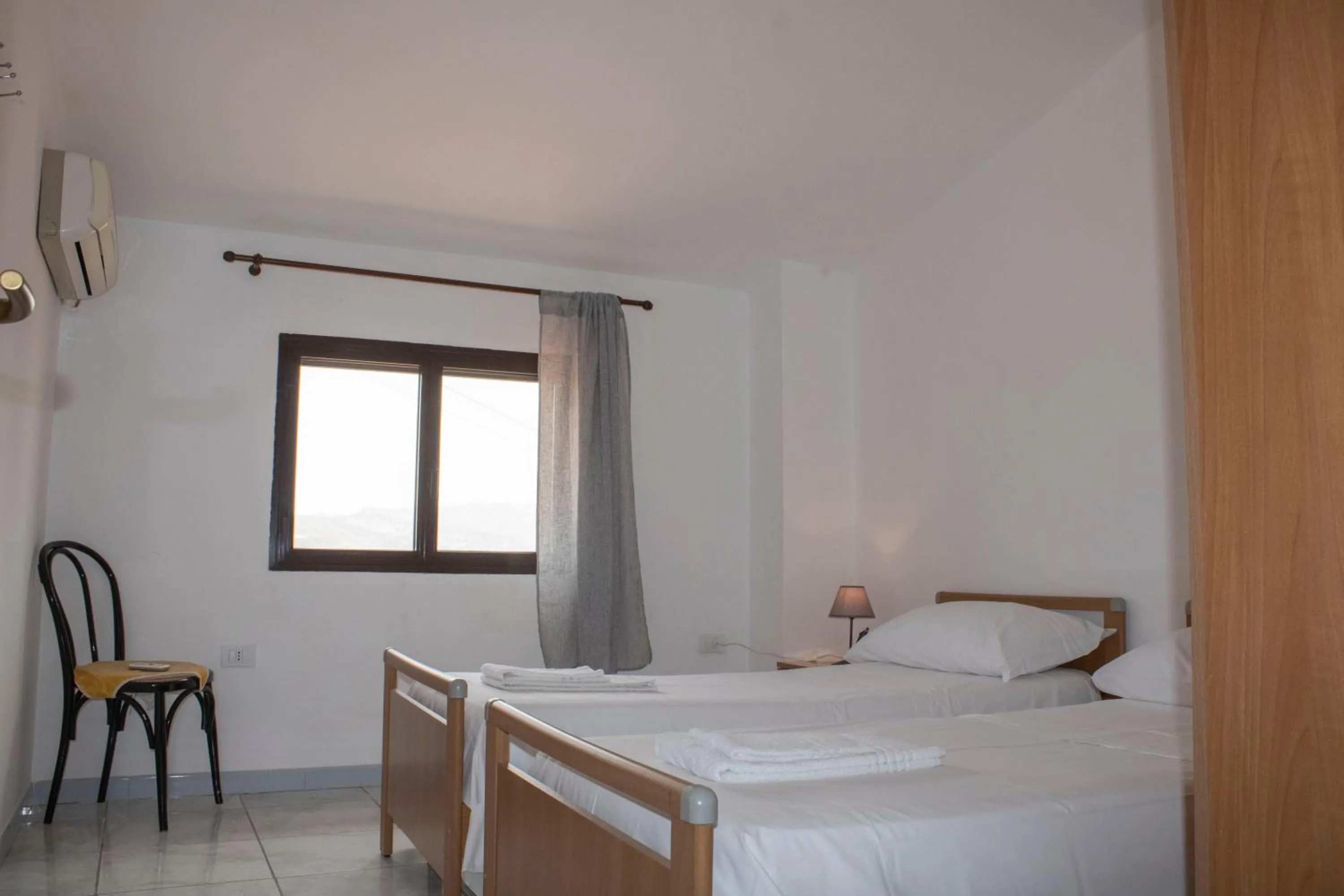 Bedroom, Bed in Agriturismo Bellajo - Ville Rustiche con Piscina