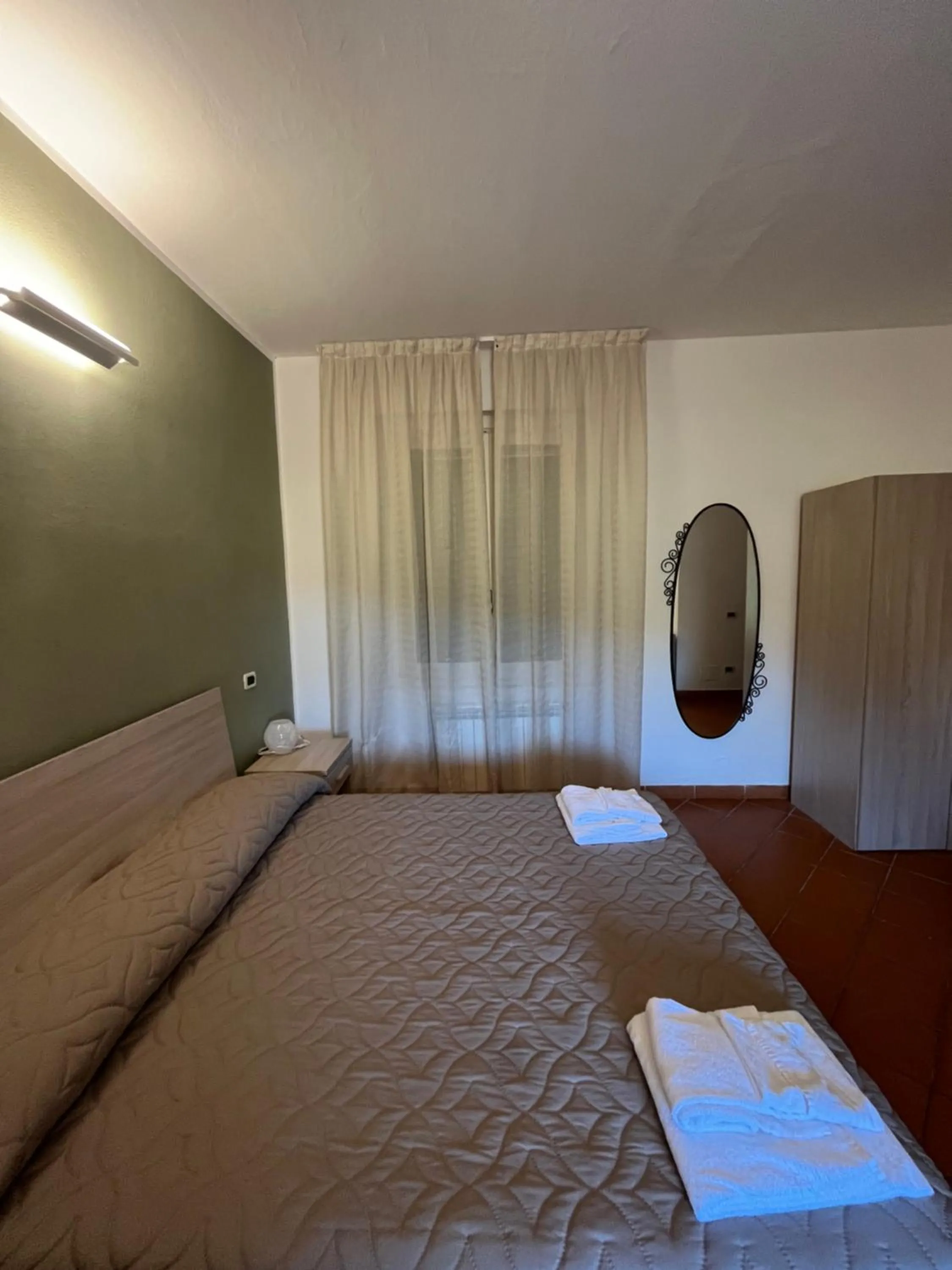 Photo of the whole room, Bed in Villaggio Della Salute Più