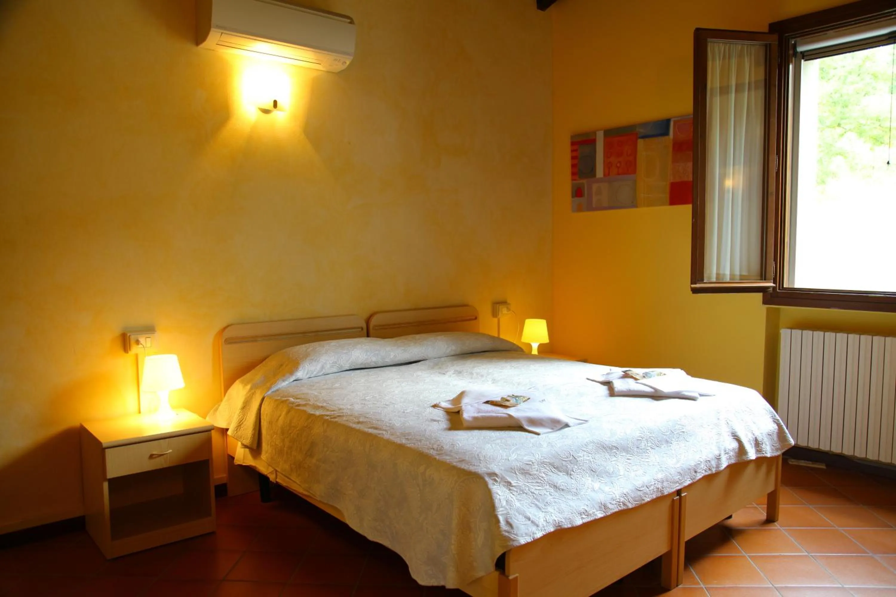 Photo of the whole room, Bed in Villaggio Della Salute Più