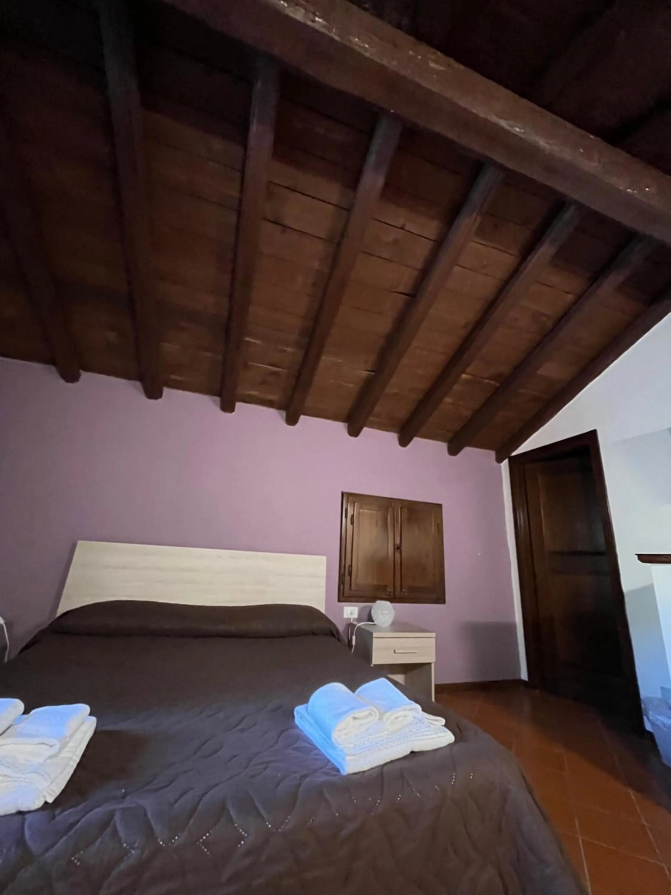 Photo of the whole room, Bed in Villaggio Della Salute Più