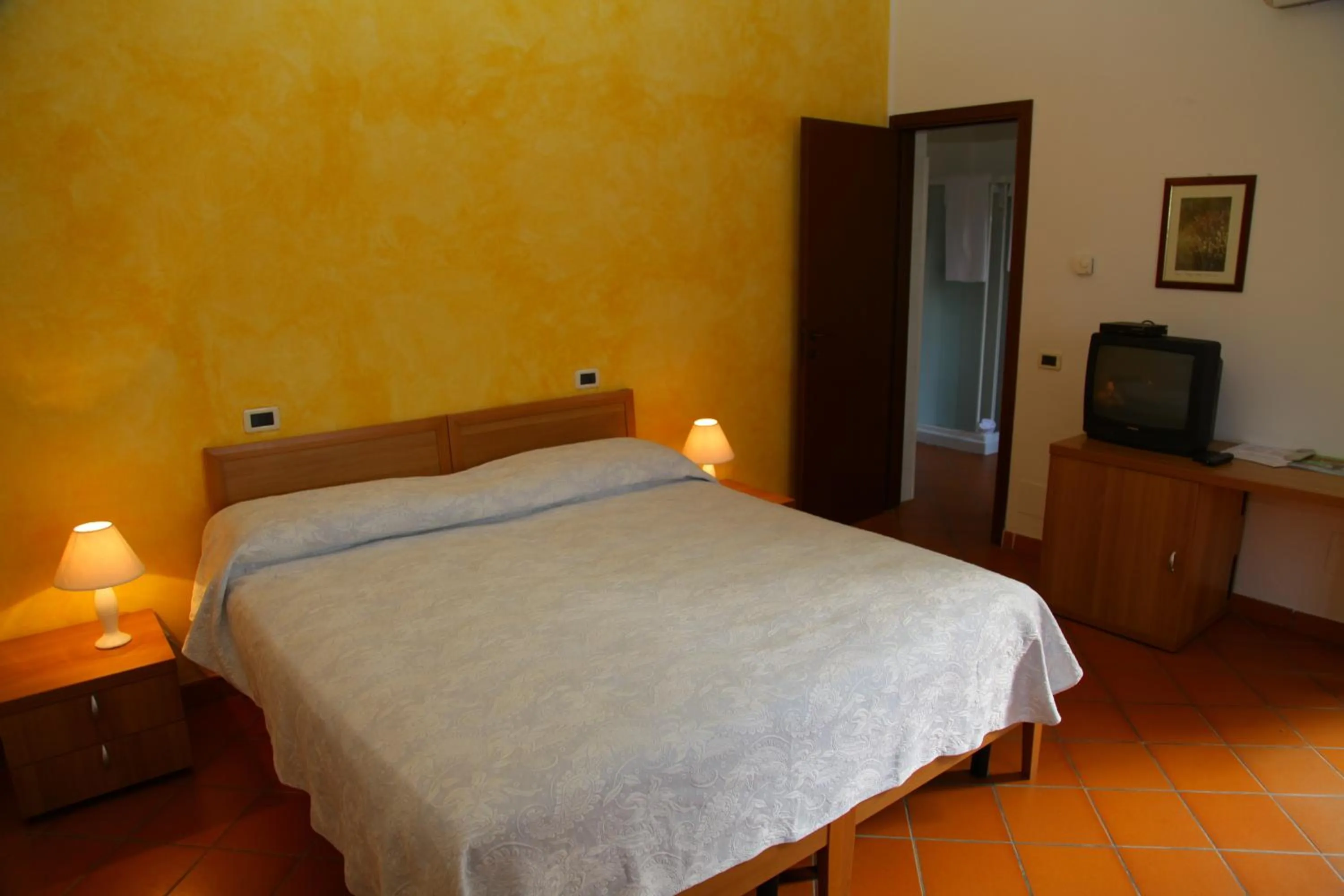 Photo of the whole room, Bed in Villaggio Della Salute Più