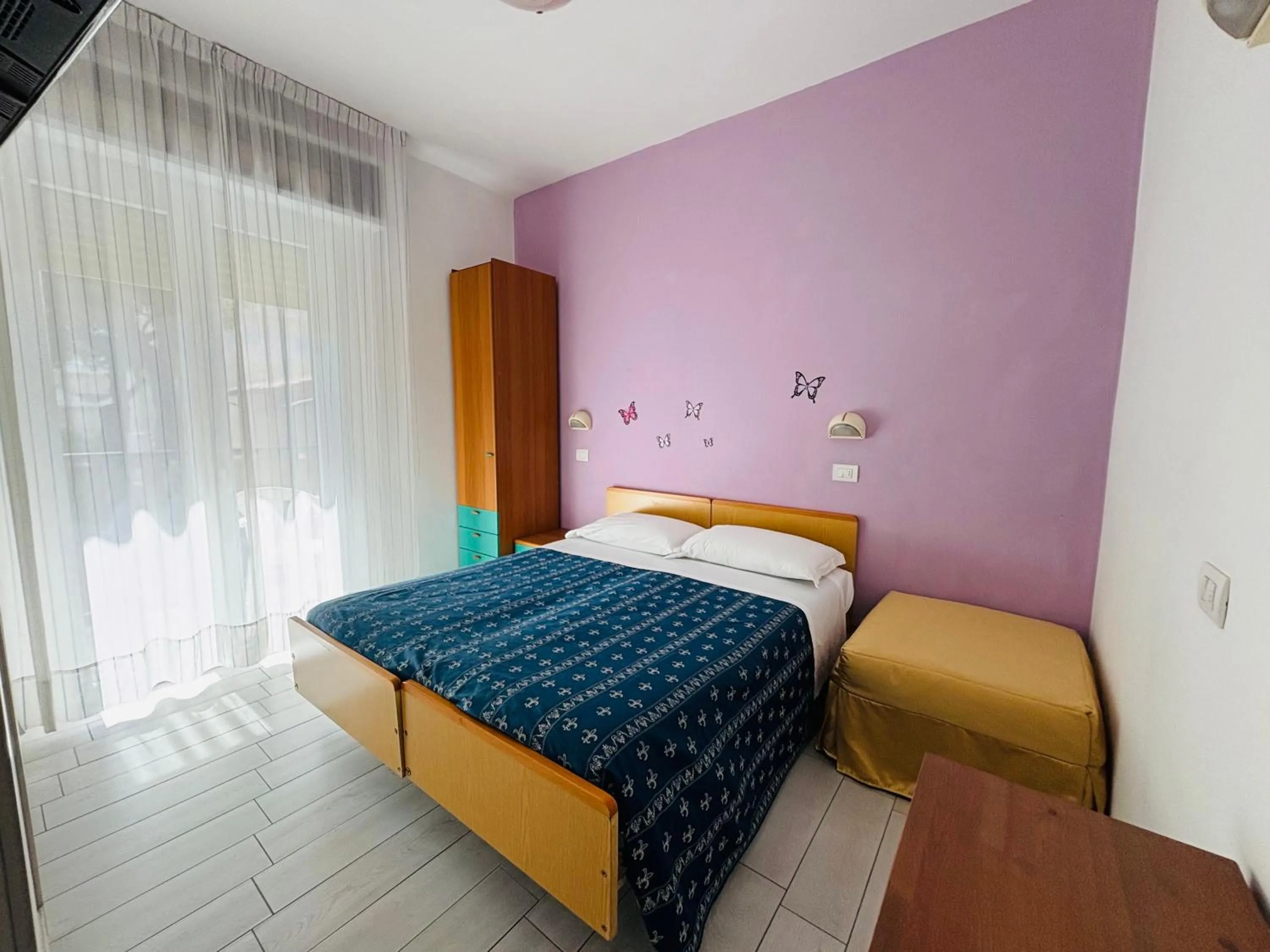 Bedroom, Bed in Hotel Iride Apartments & Rooms- ideale per famiglie e coppie