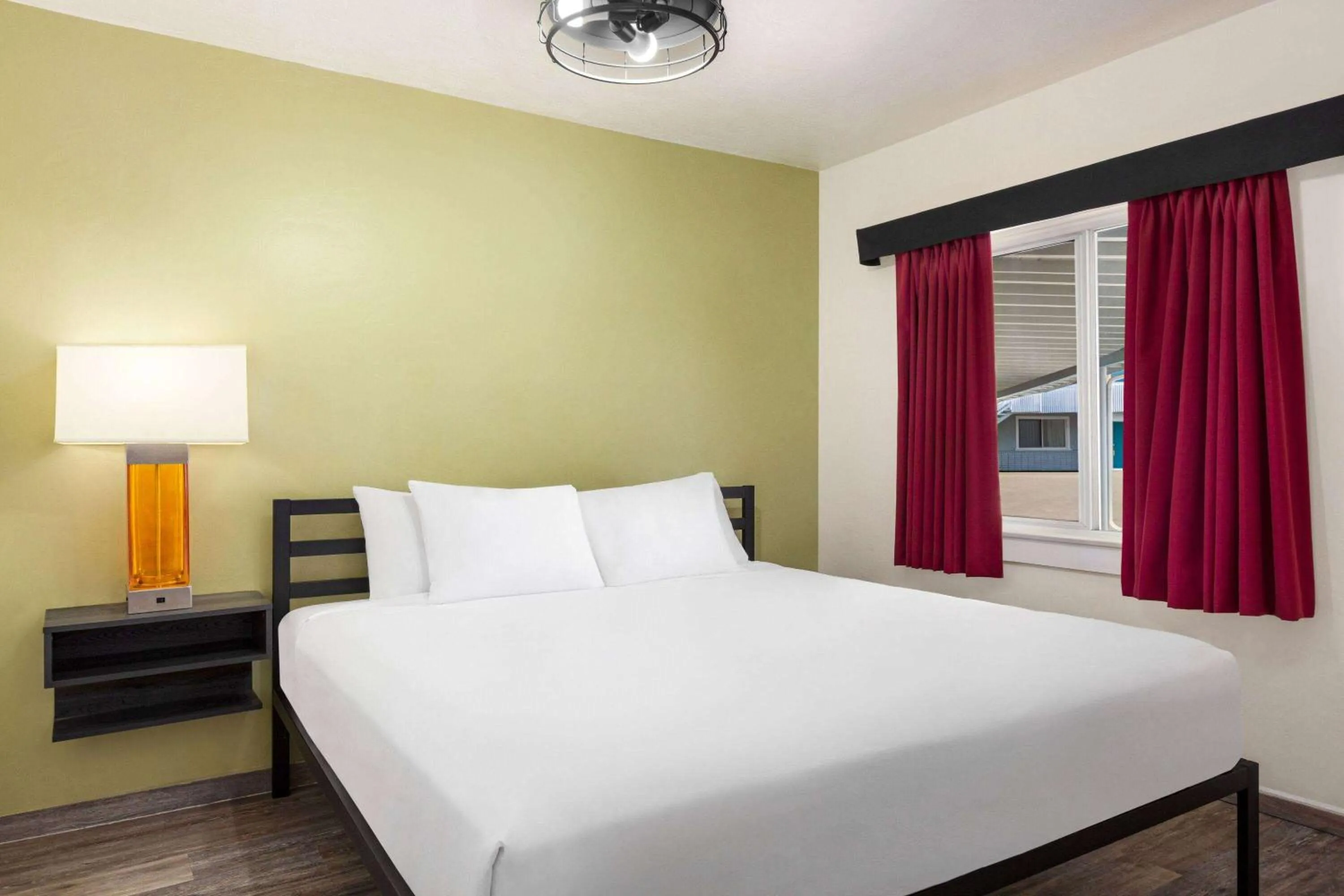 Photo of the whole room, Bed in Baymont by Wyndham Fort Bragg