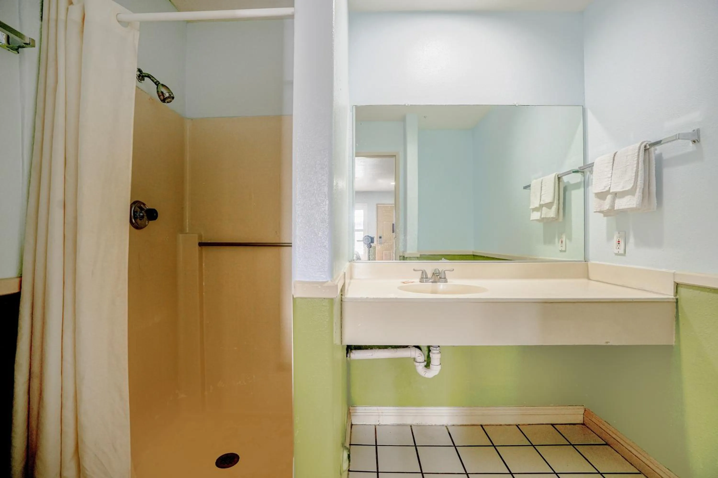 Bathroom in Day & Night Inn