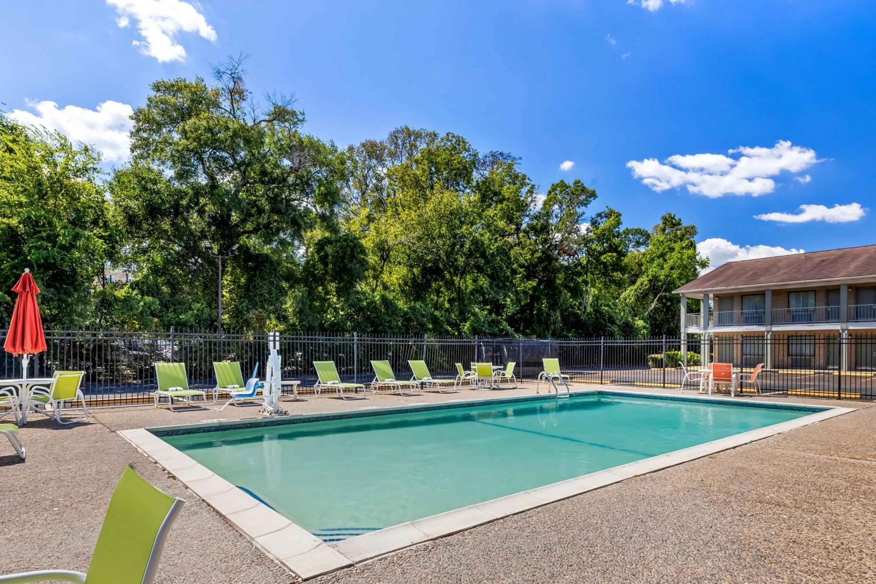 Pool view in SureStay Plus by Best Western Beaumont