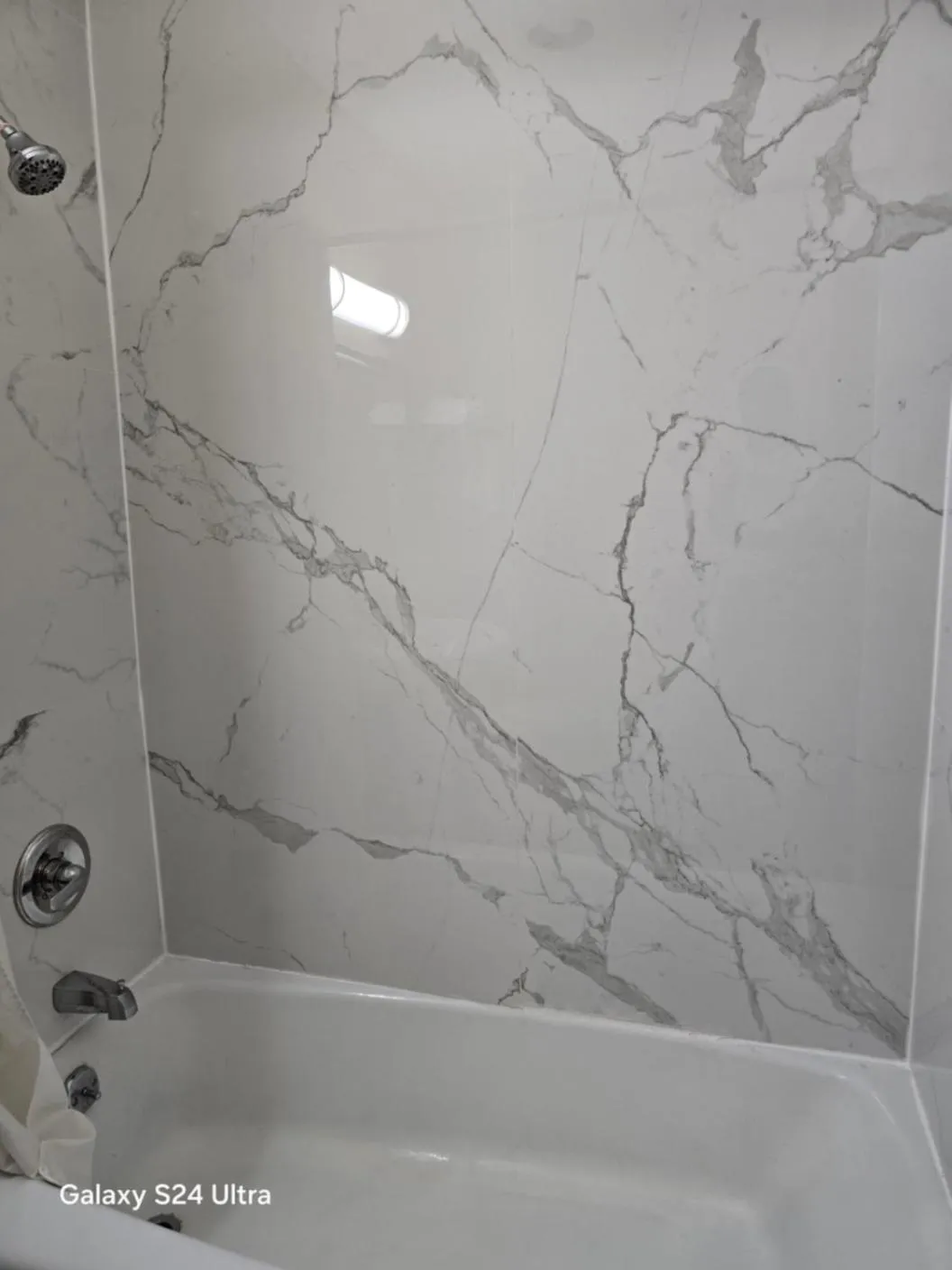 Shower in Econo Lodge Inn & Suites