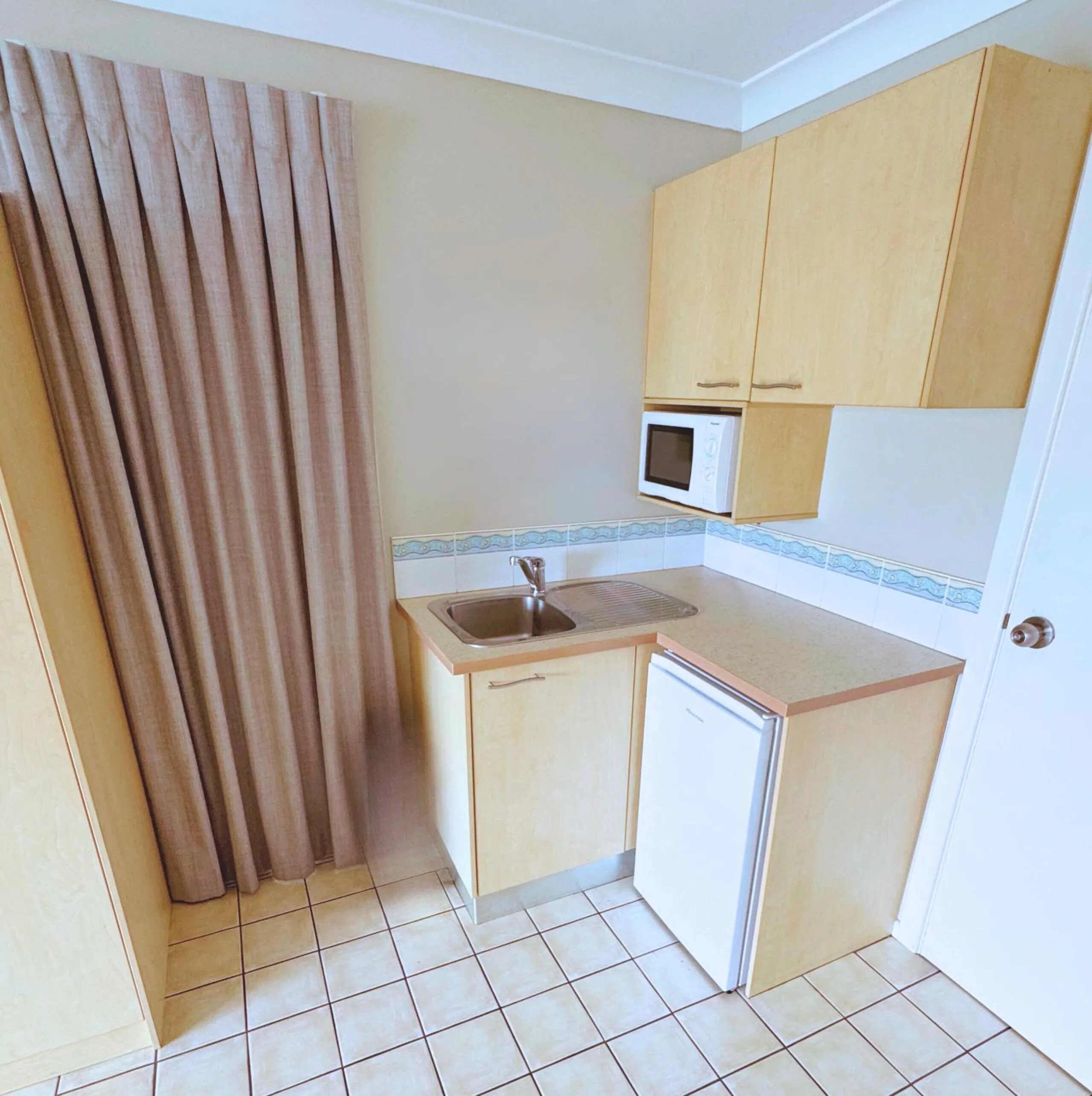 Kitchen or kitchenette in Yamba Sun