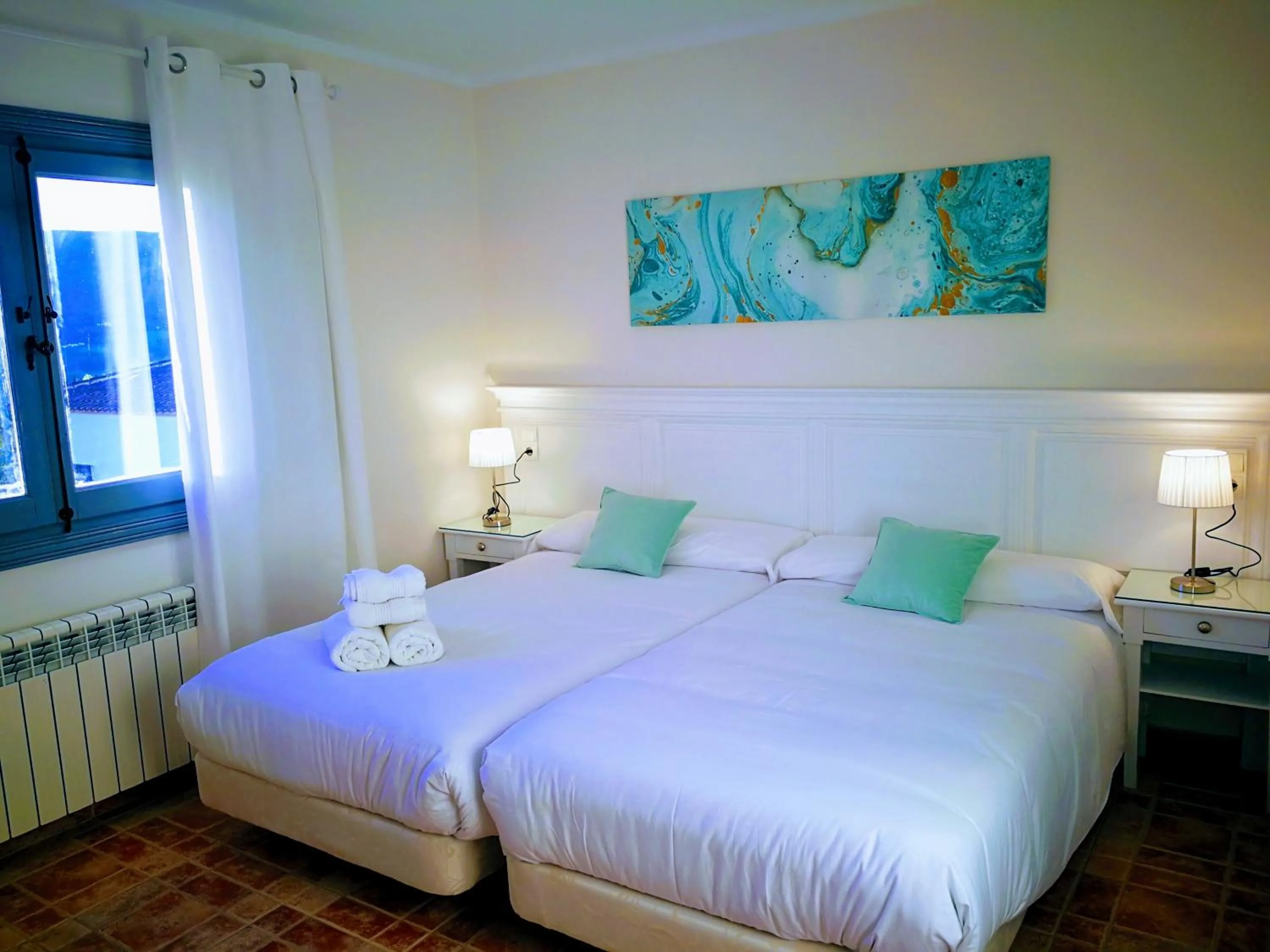 Bed in Hotel Ronda Moments