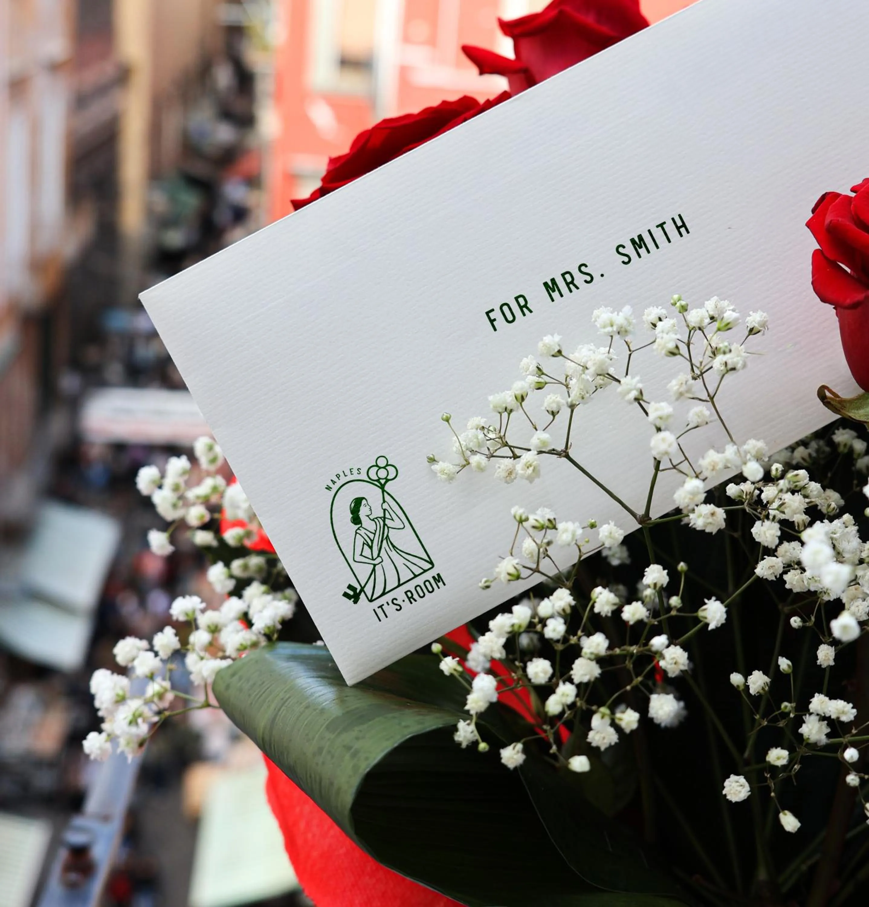 Property logo or sign in It's Room Naples