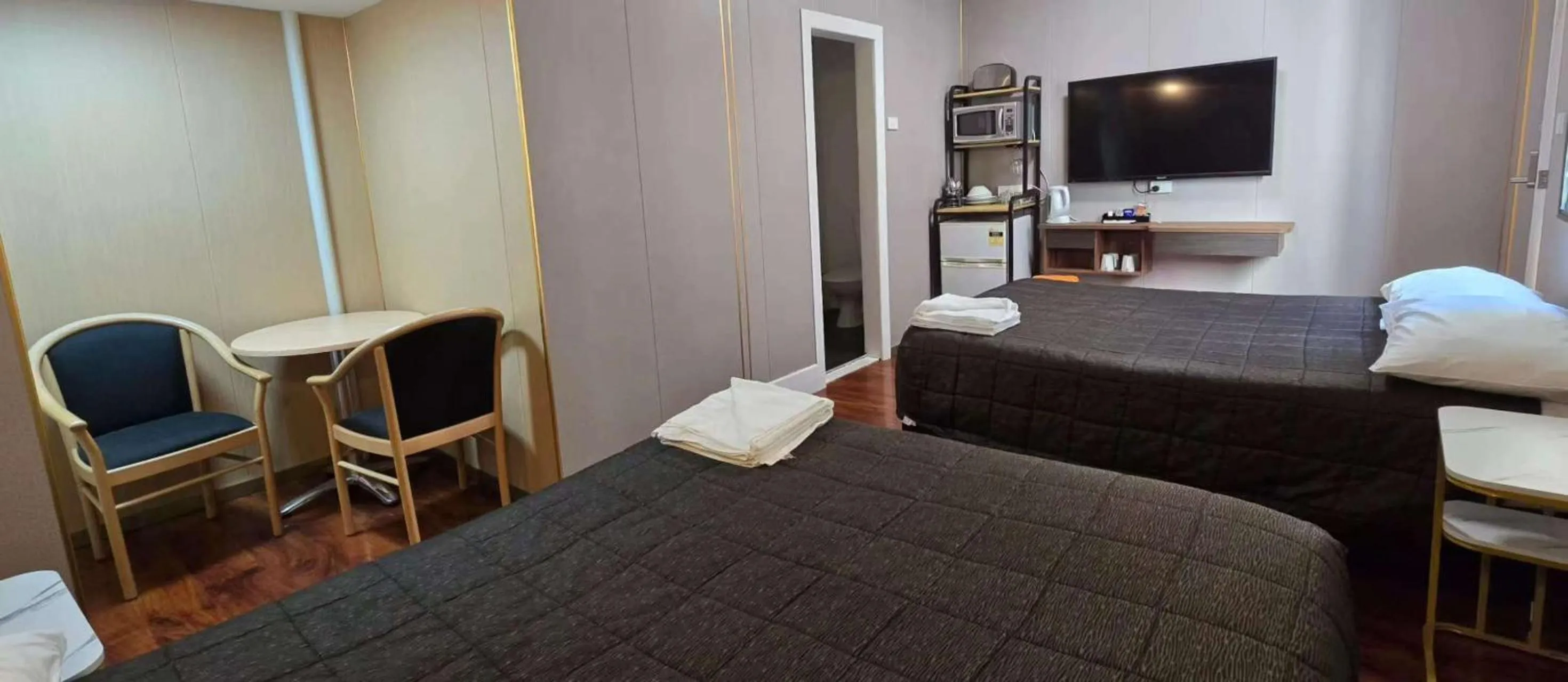 Bed in Alpine Heritage Motel