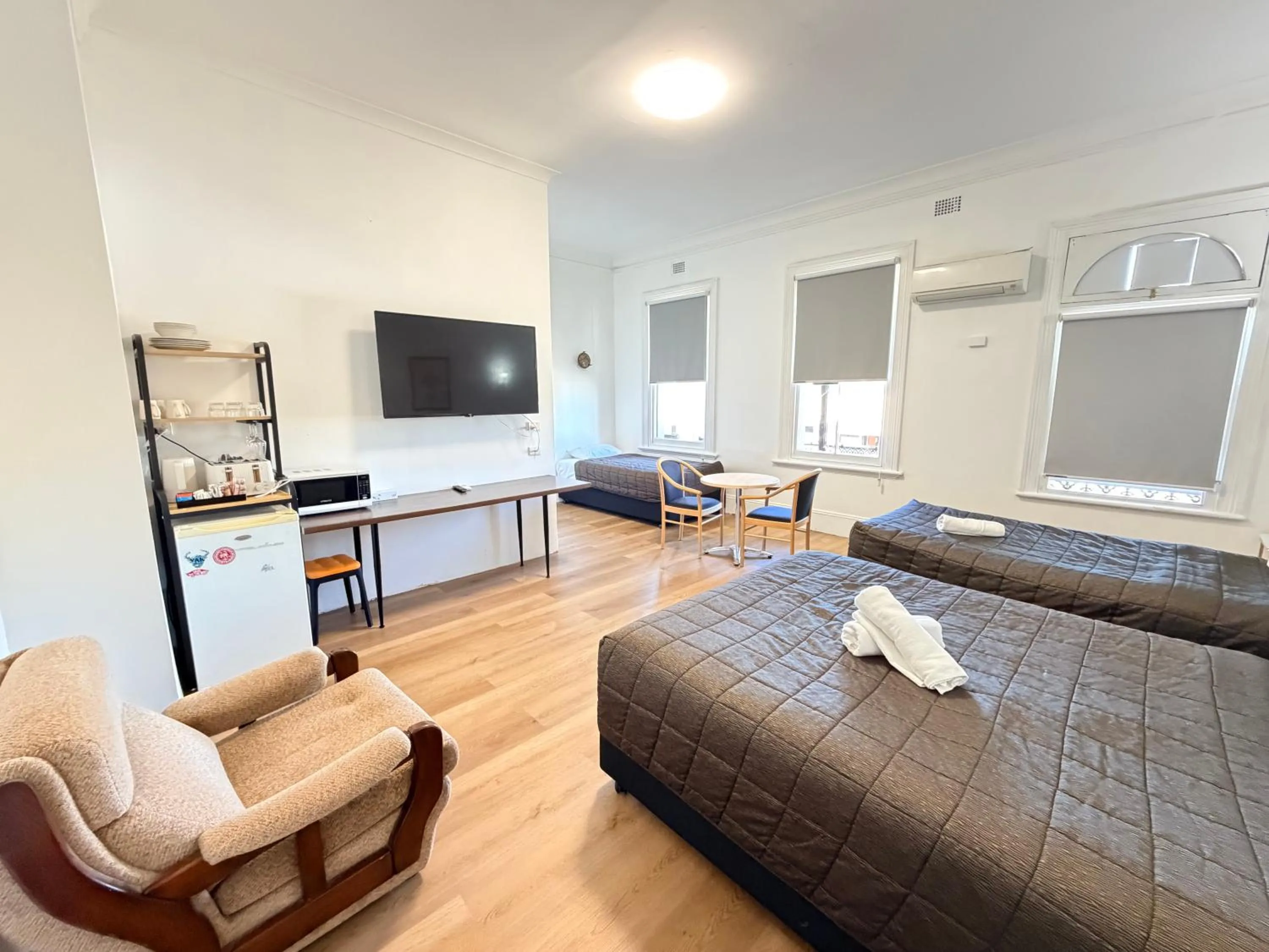 Bed in Alpine Heritage Motel