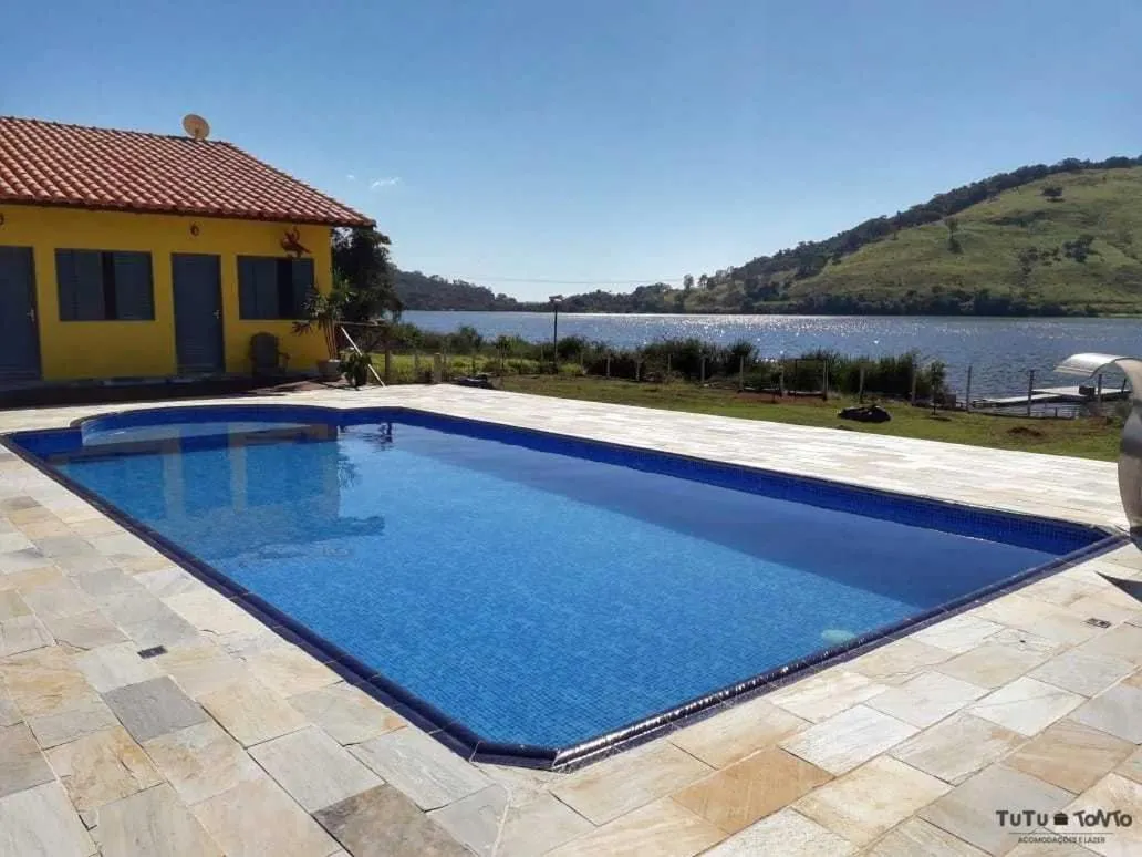 Swimming pool in TuTu TonTo Acomodações e Lazer